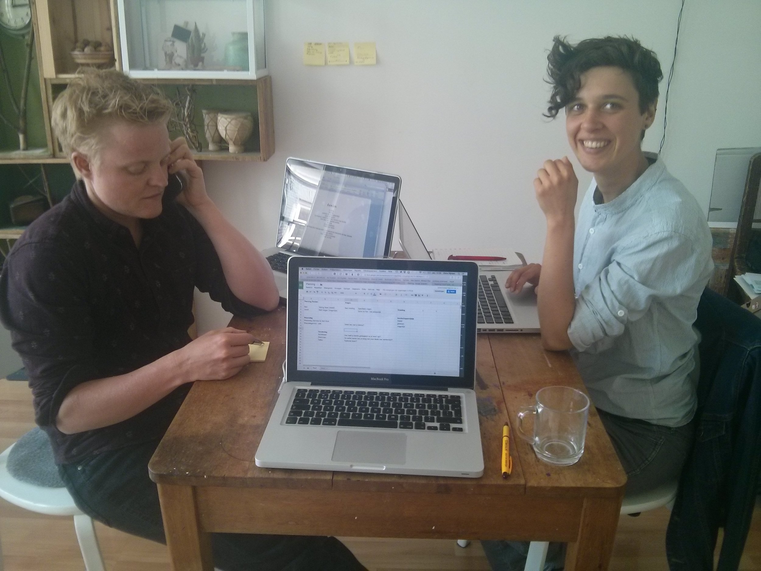 Director Bart is making important phone calls. Producer Jonah squeezes out a smile.