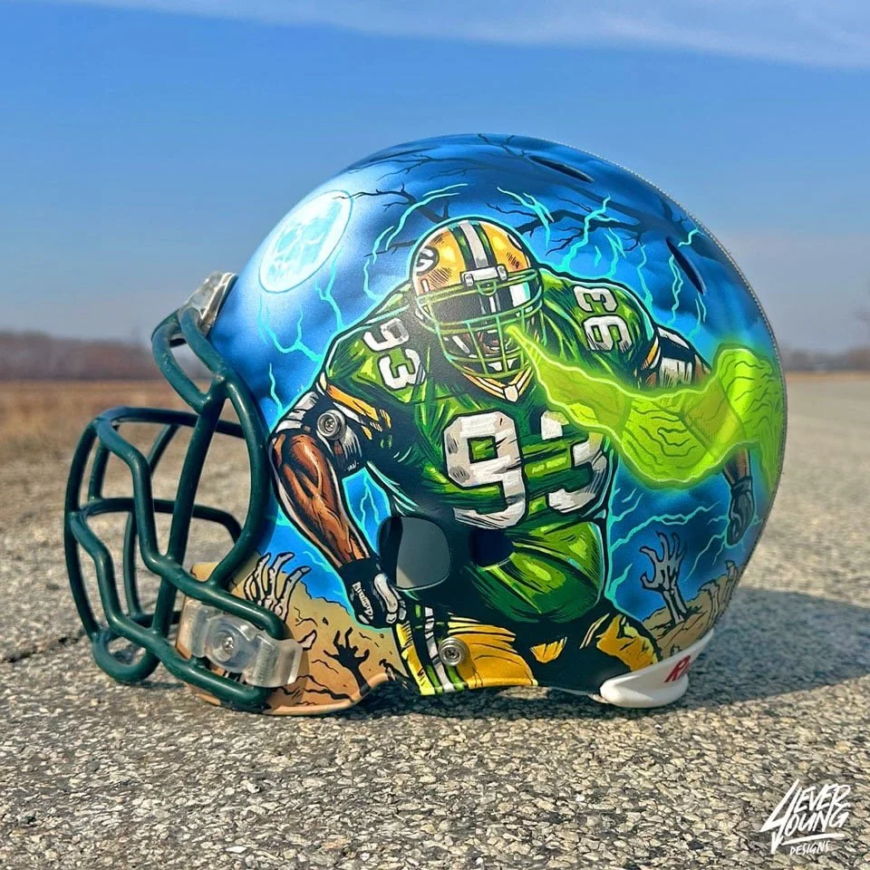 A 1/1 custom painted football helmet. Featuring Green Bay Packers legend, Gilbert Brown, AKA The Gravedigger!
