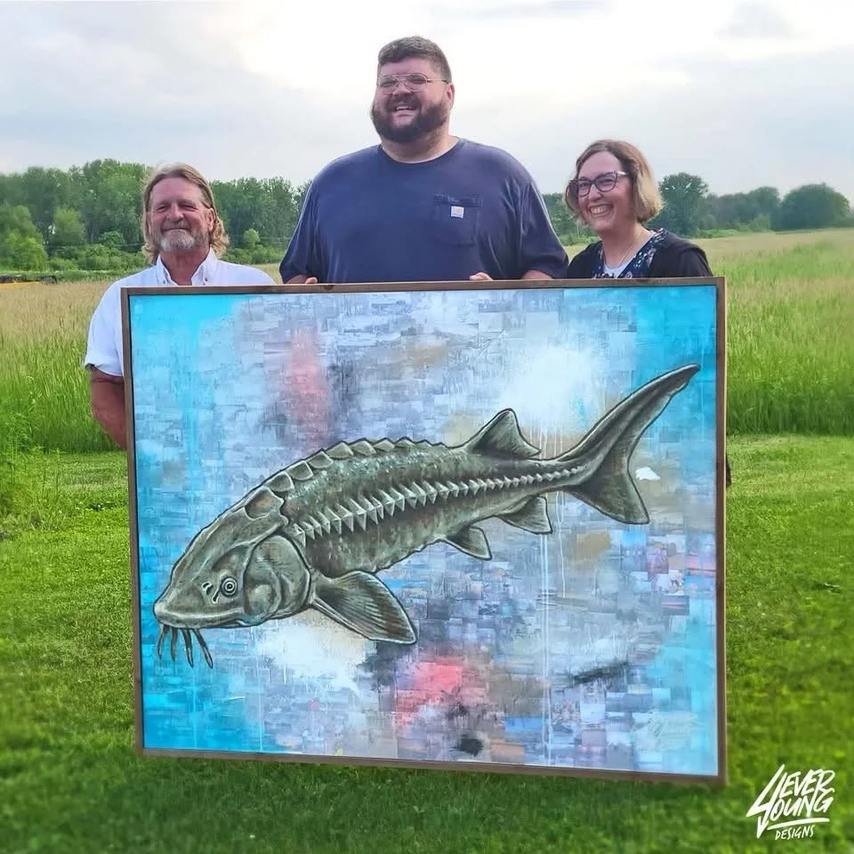 Where do I even begin?

After historic flooding impacted my hometown of Shiocton, I created a sturgeon painting to raise funds for those affected. What started as a simple idea became something much bigger thanks to the incredible support of our comm