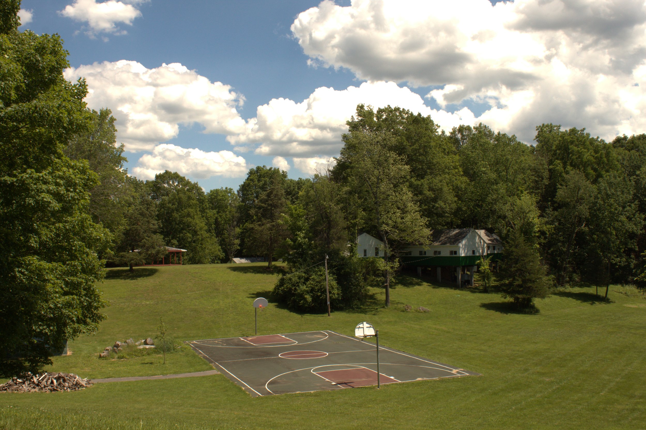  Our campus has several sports facilities, including a basketball court, soccer field, and gaga ball pit. 