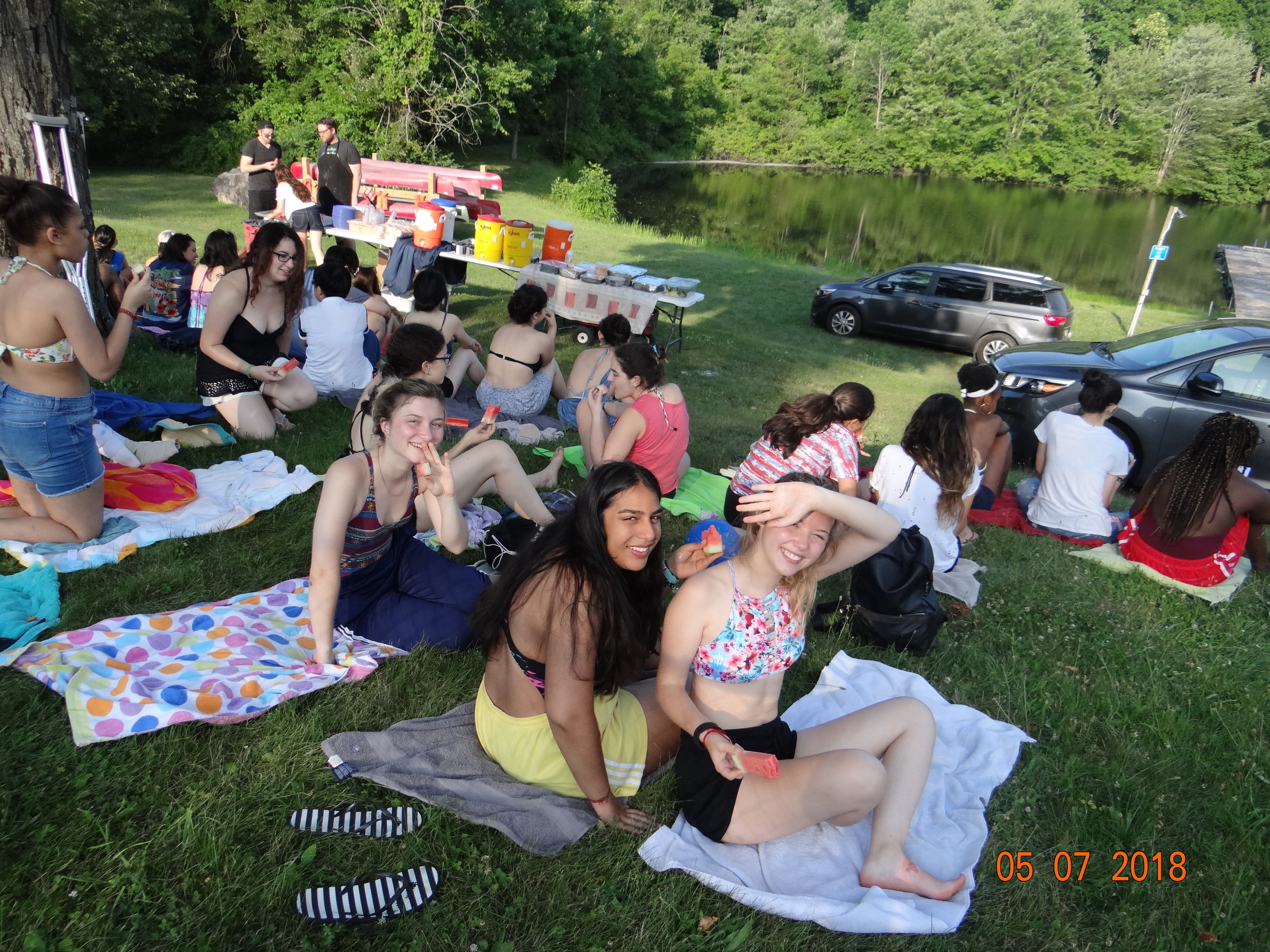 Campers enjoying watermelon.JPG