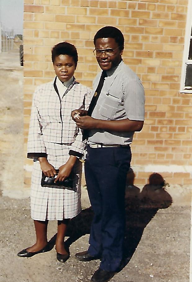 Grace and her father at an airport in Zambia before camp.