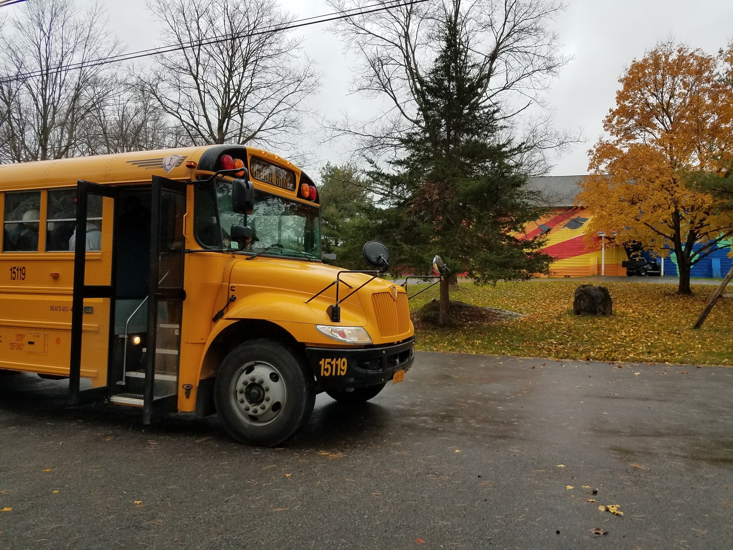  A school bus parked outside the Main Building 