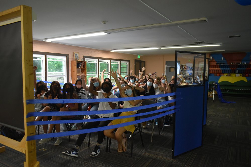   Campers celebrate in the makeshift airplane constructed by 2YC’s  