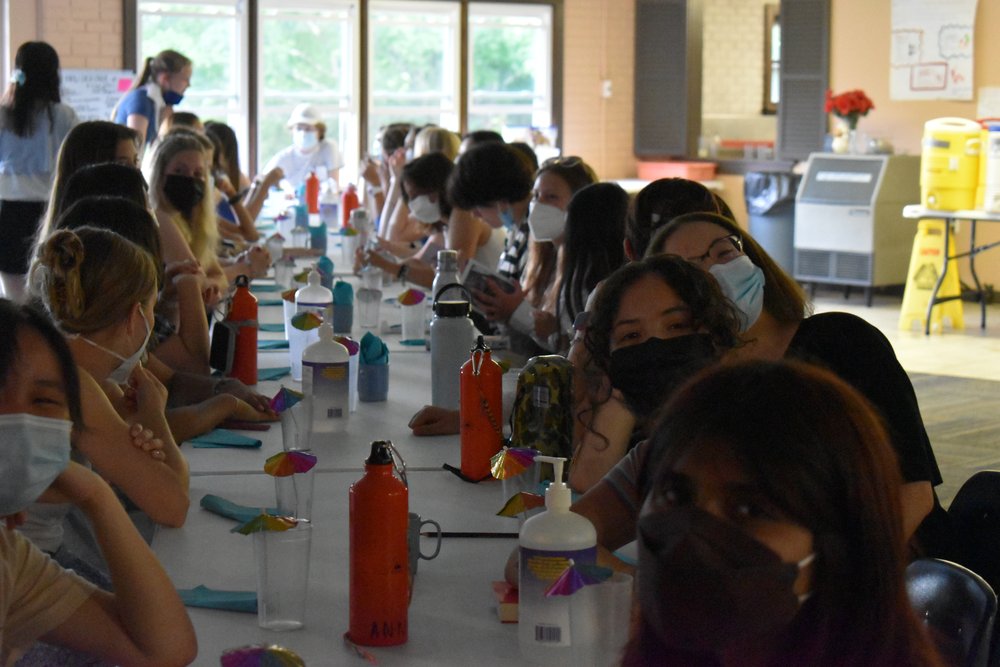   Campers excitedly wait for the Greek food (in the spirit of Mamma Mia) prepared by kitchen staff!  