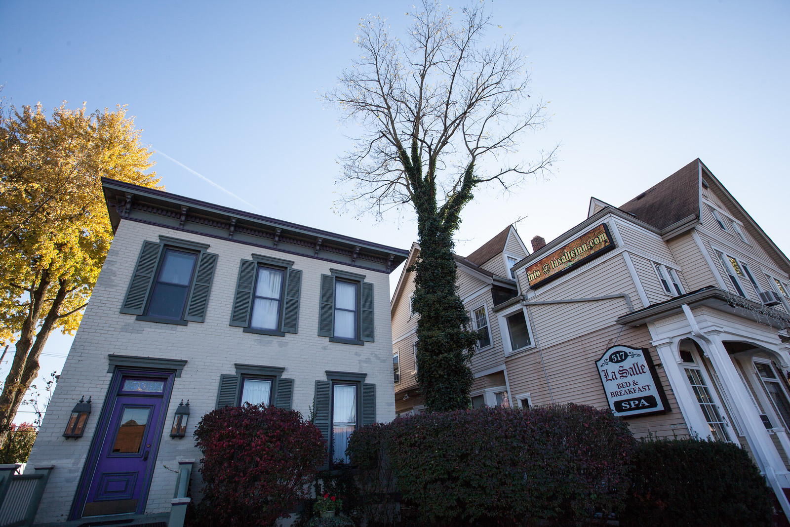 509 W Washington, the historic Sion Bass House has a hard to miss purple door and sits to the left of the LaSalle