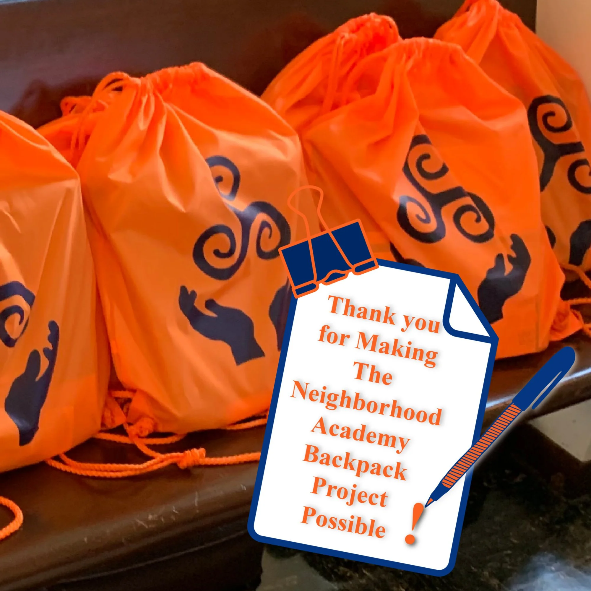 Orange Neighborhood Academy backpacks on St. Michaels of the Valley church pew