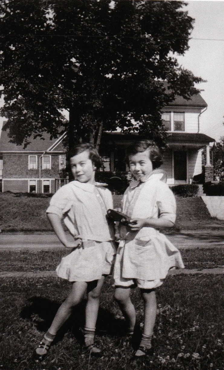 The twins – Kathryn with camera, Franny striking a pose