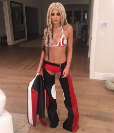Kylie Jenner as Christina Aguilera from her “Dirrty” video in 2002. She aced this look without a doubt. Yassss Kylie!!!