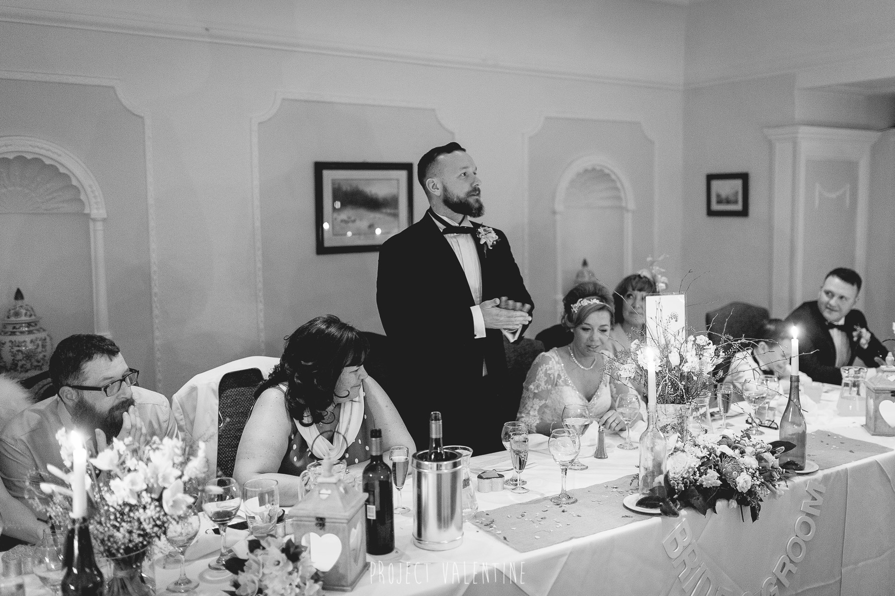 groom giving speech during wedding breakfast