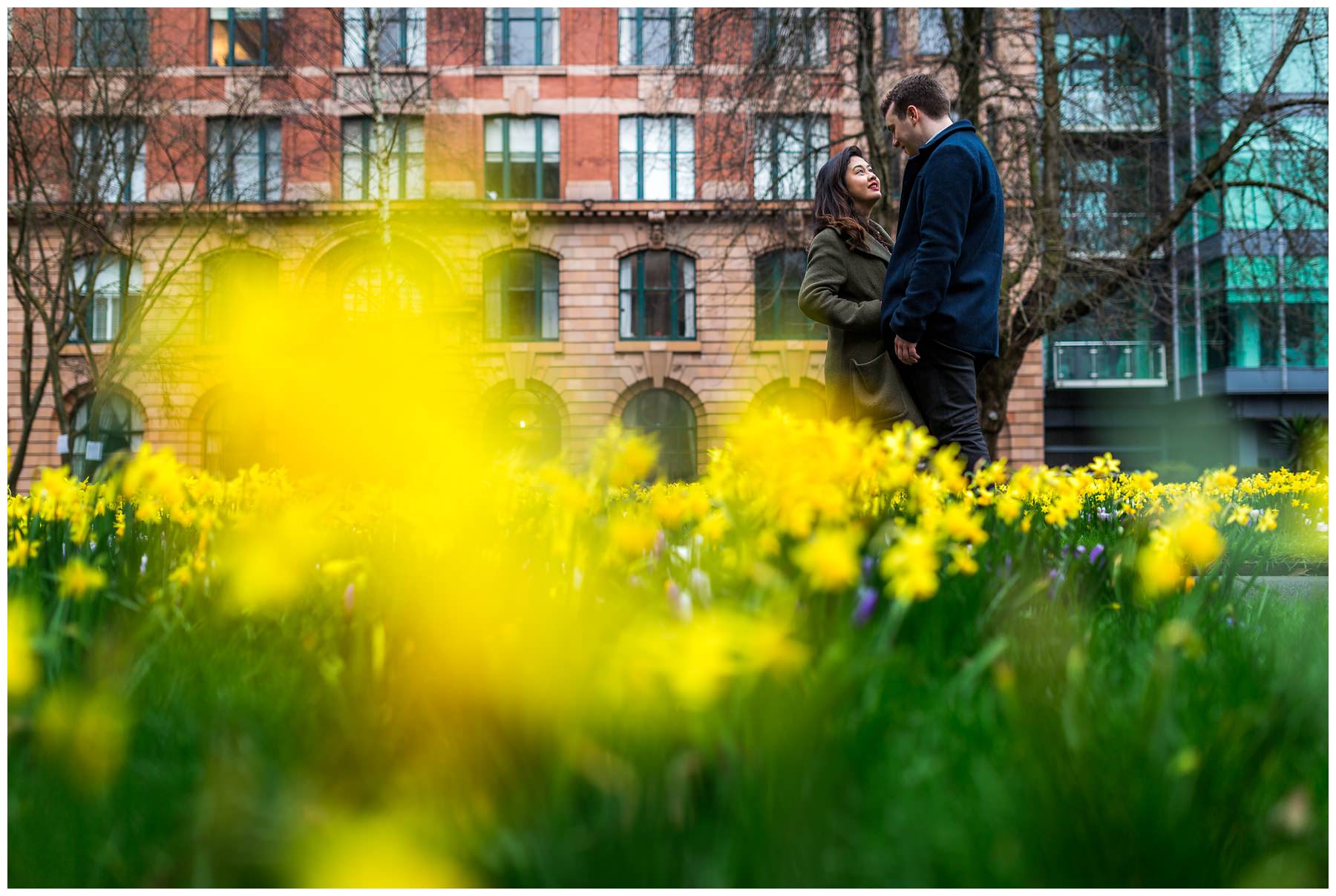 shot of couple with daffodils 