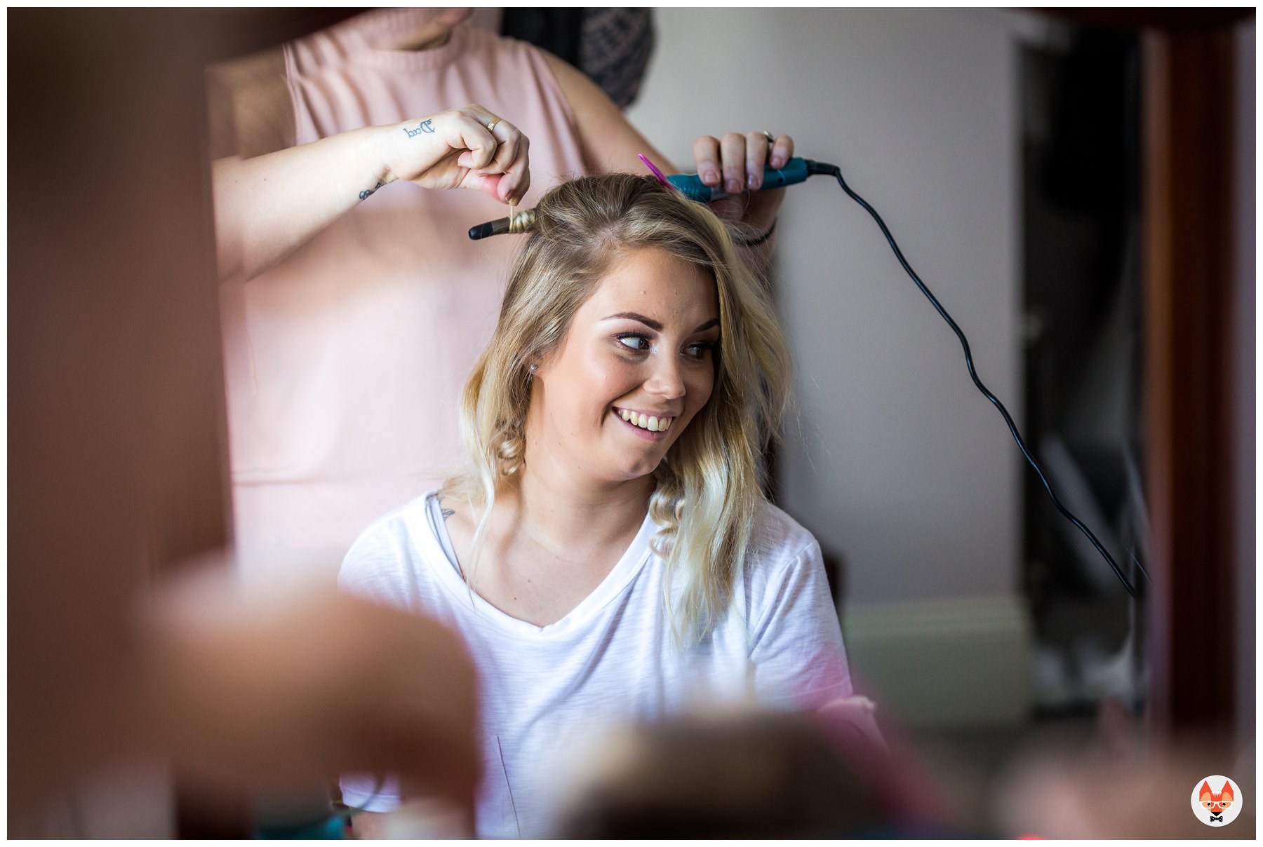 bride having her hair done