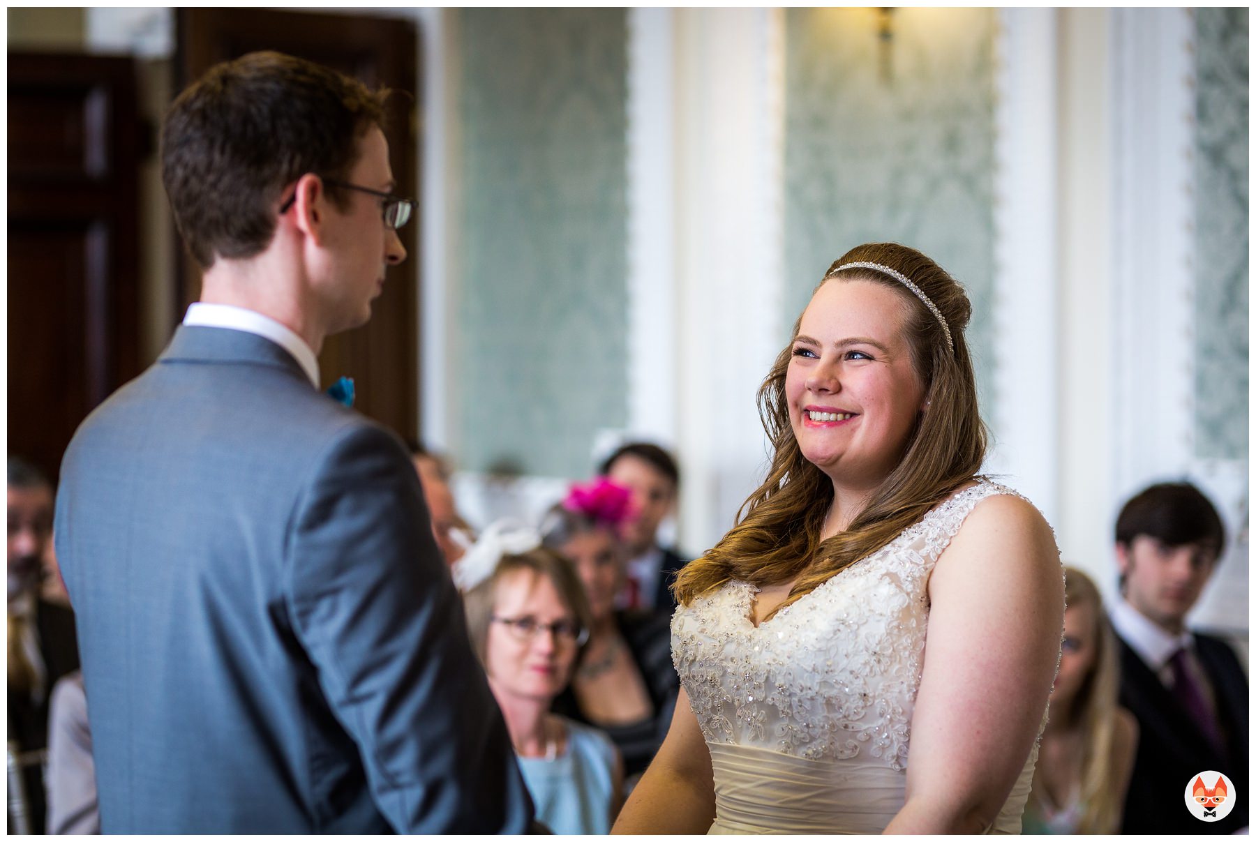 bride smiling during service