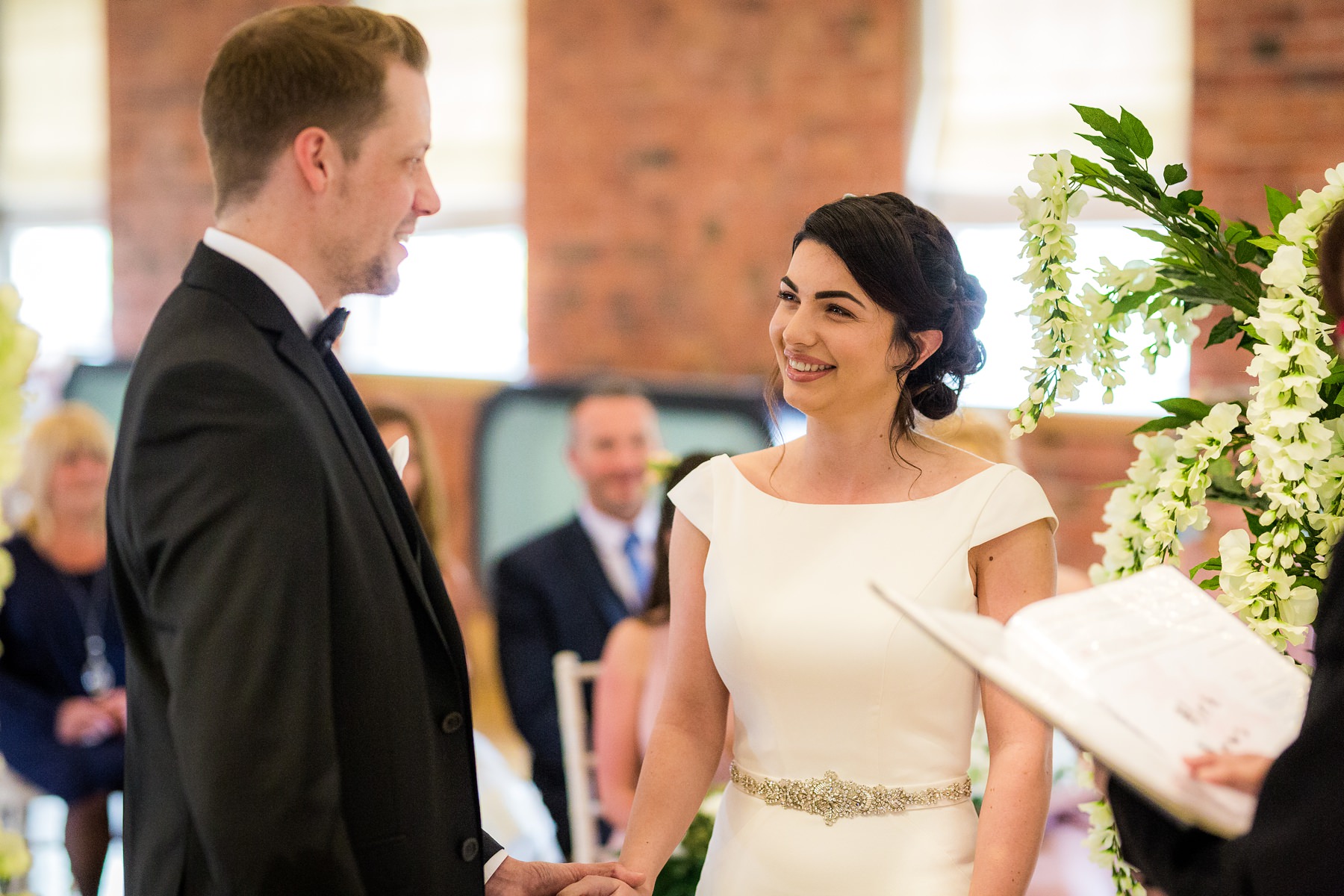 bride smiling at groom