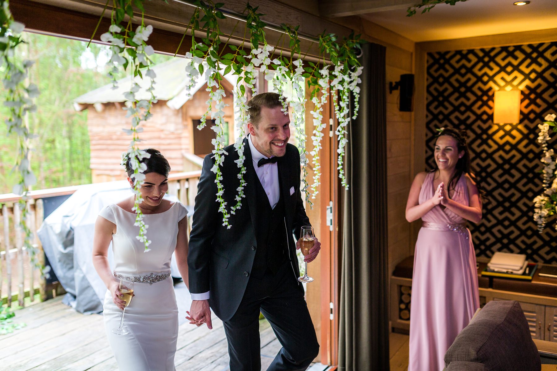 bride and groom entering the room