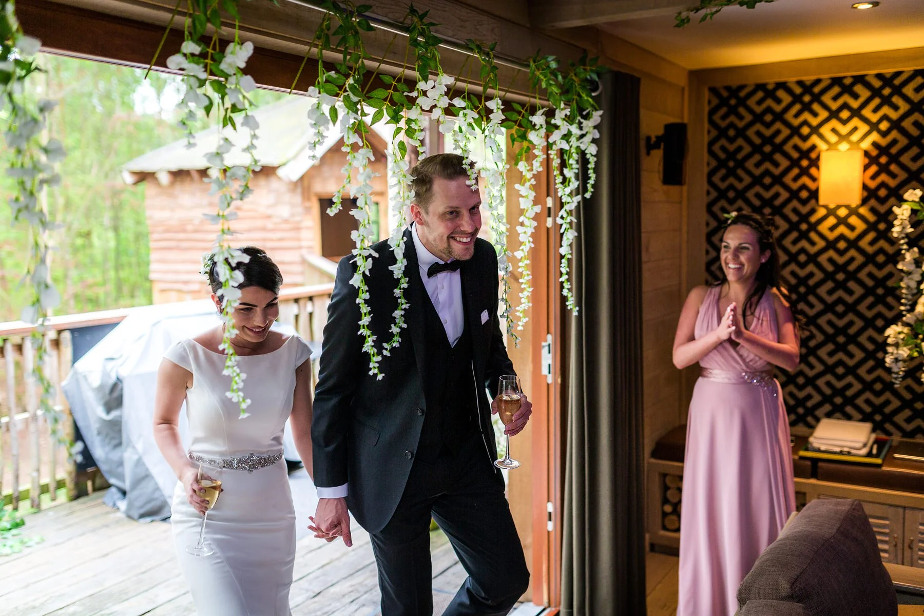 bride and groom entering the room