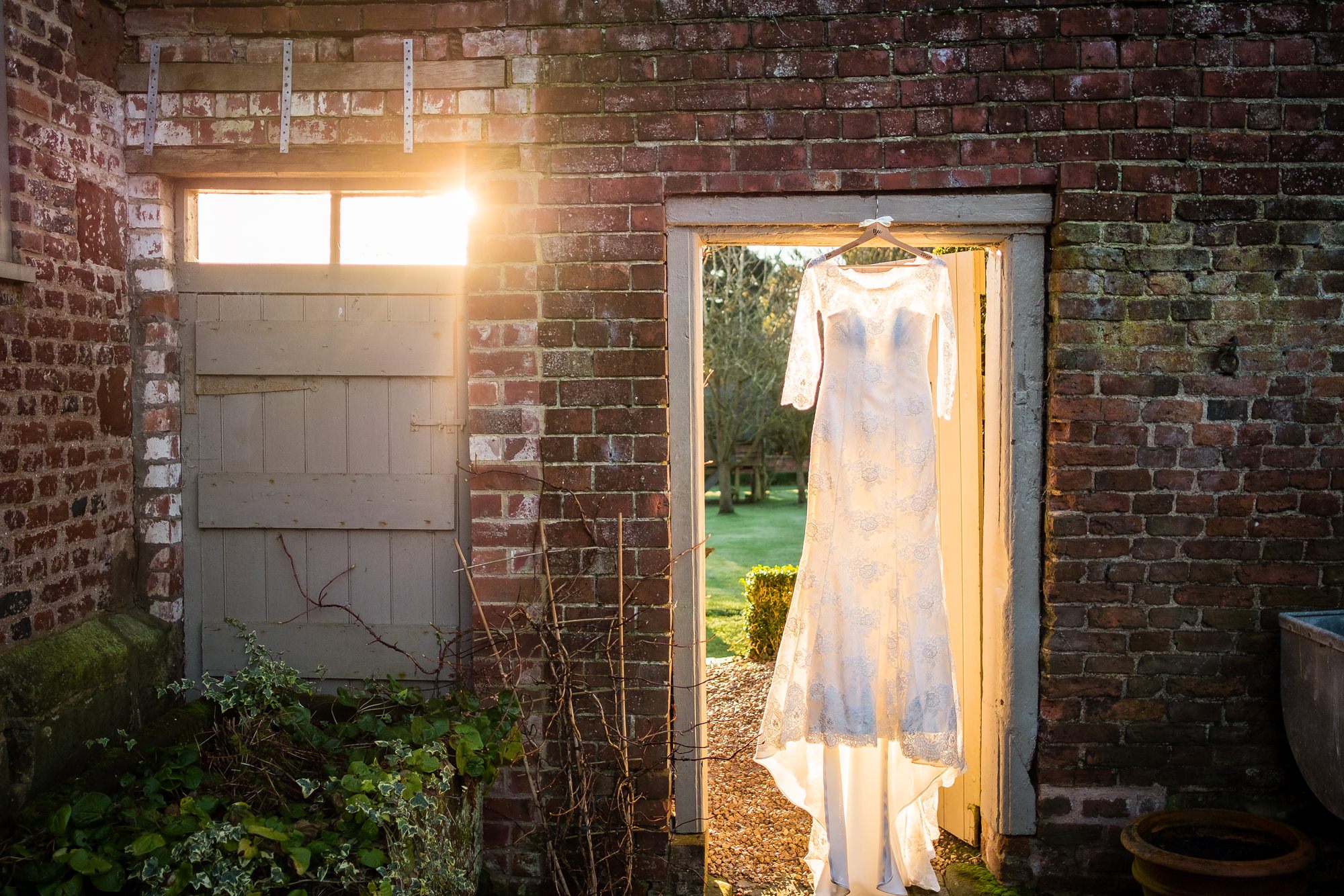 wedding dress hung near pimhill barn