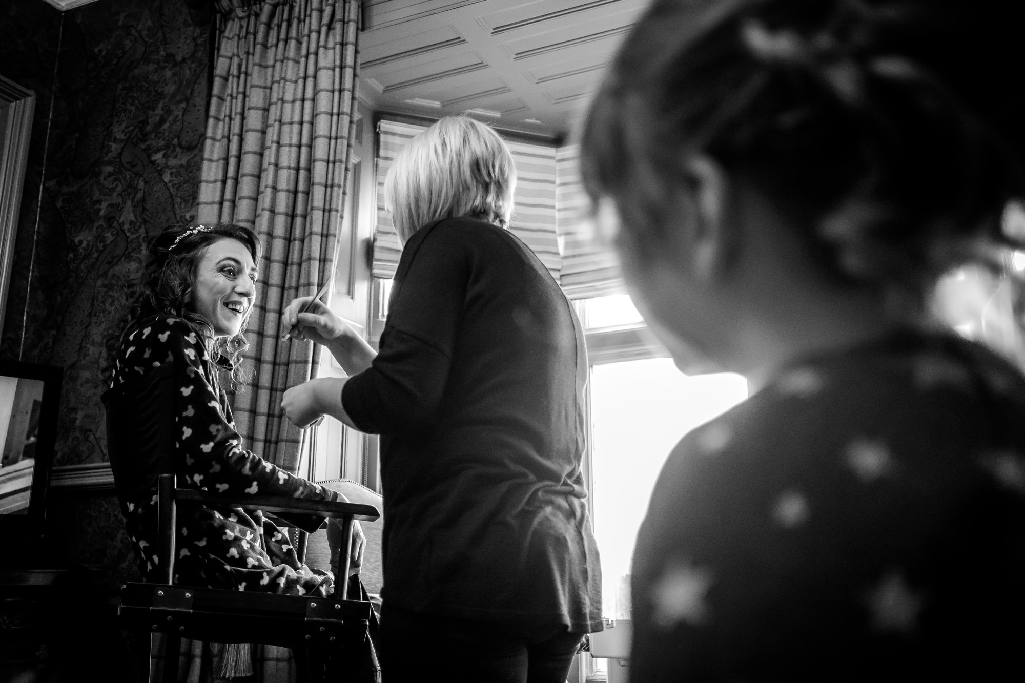 bridesmaid having her makeup done