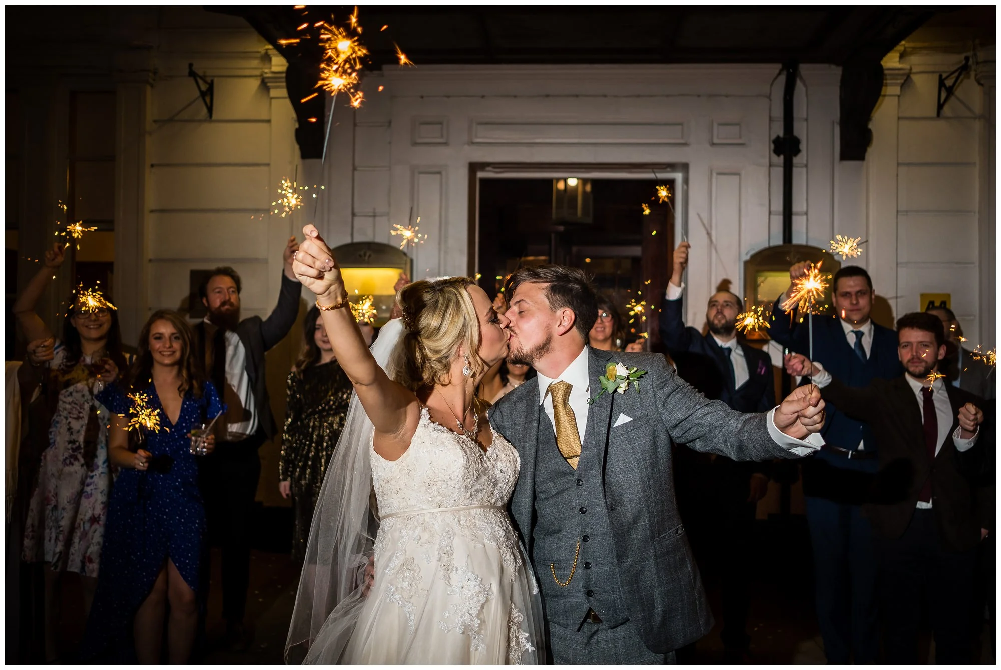 bride and groom with sparklers