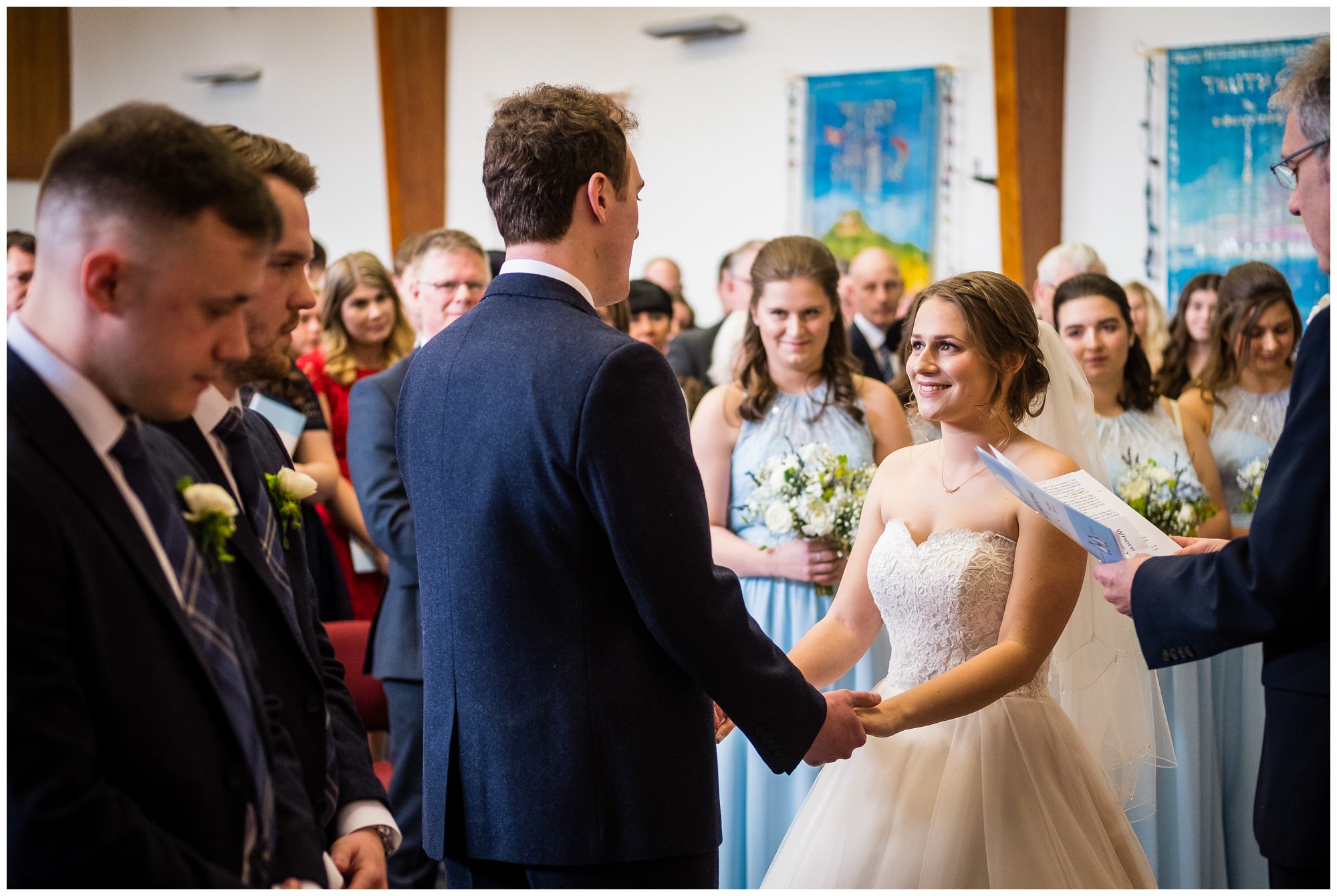 bride and groom during service