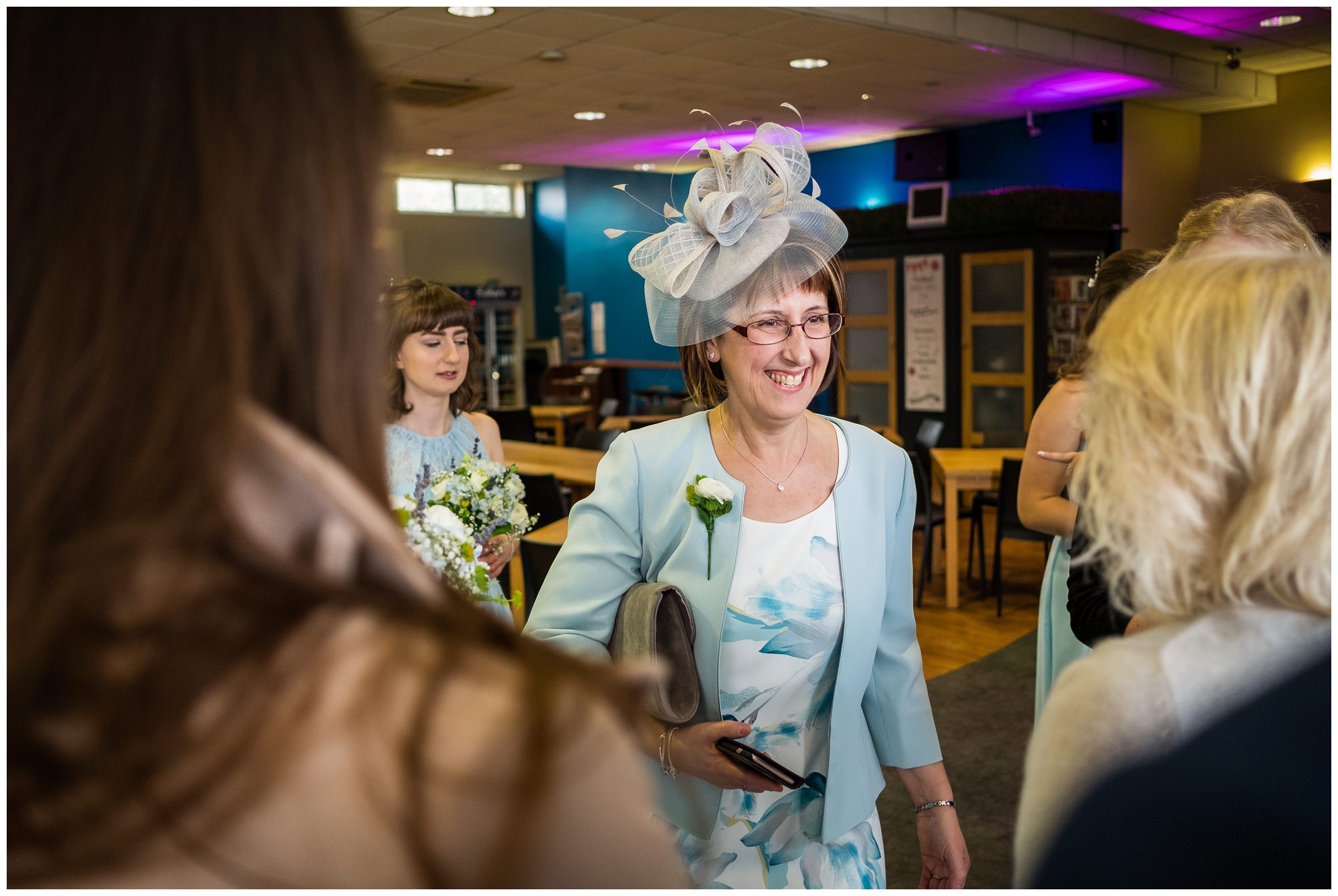 brides mum greeting guests