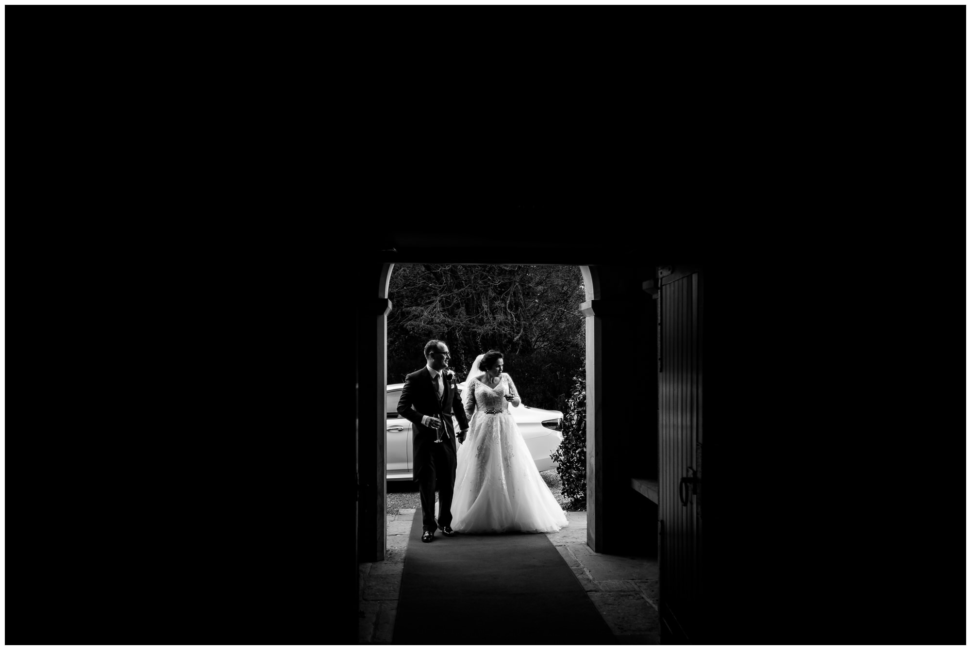bride and groom waiting to enter room