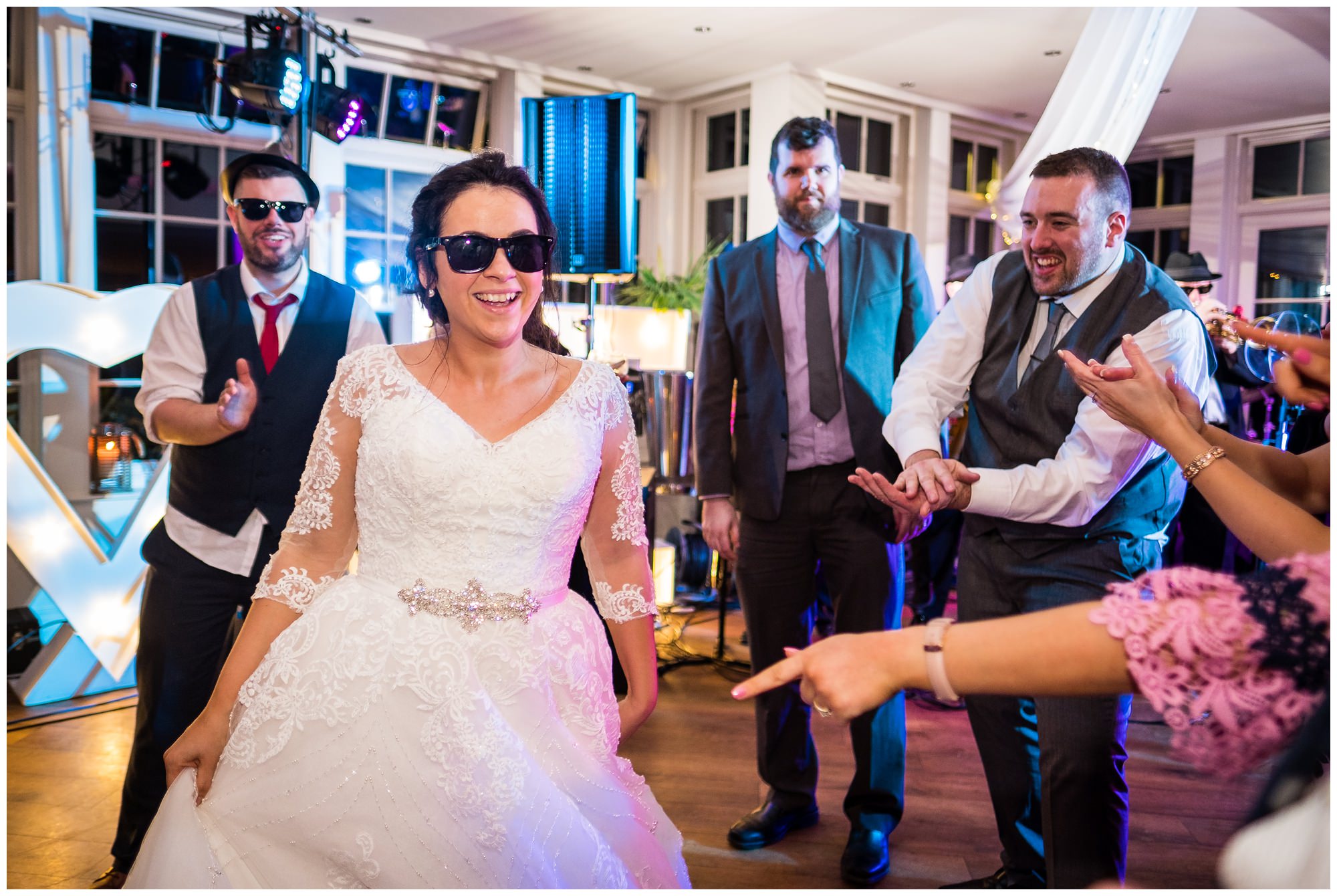 bride with sunglasses on