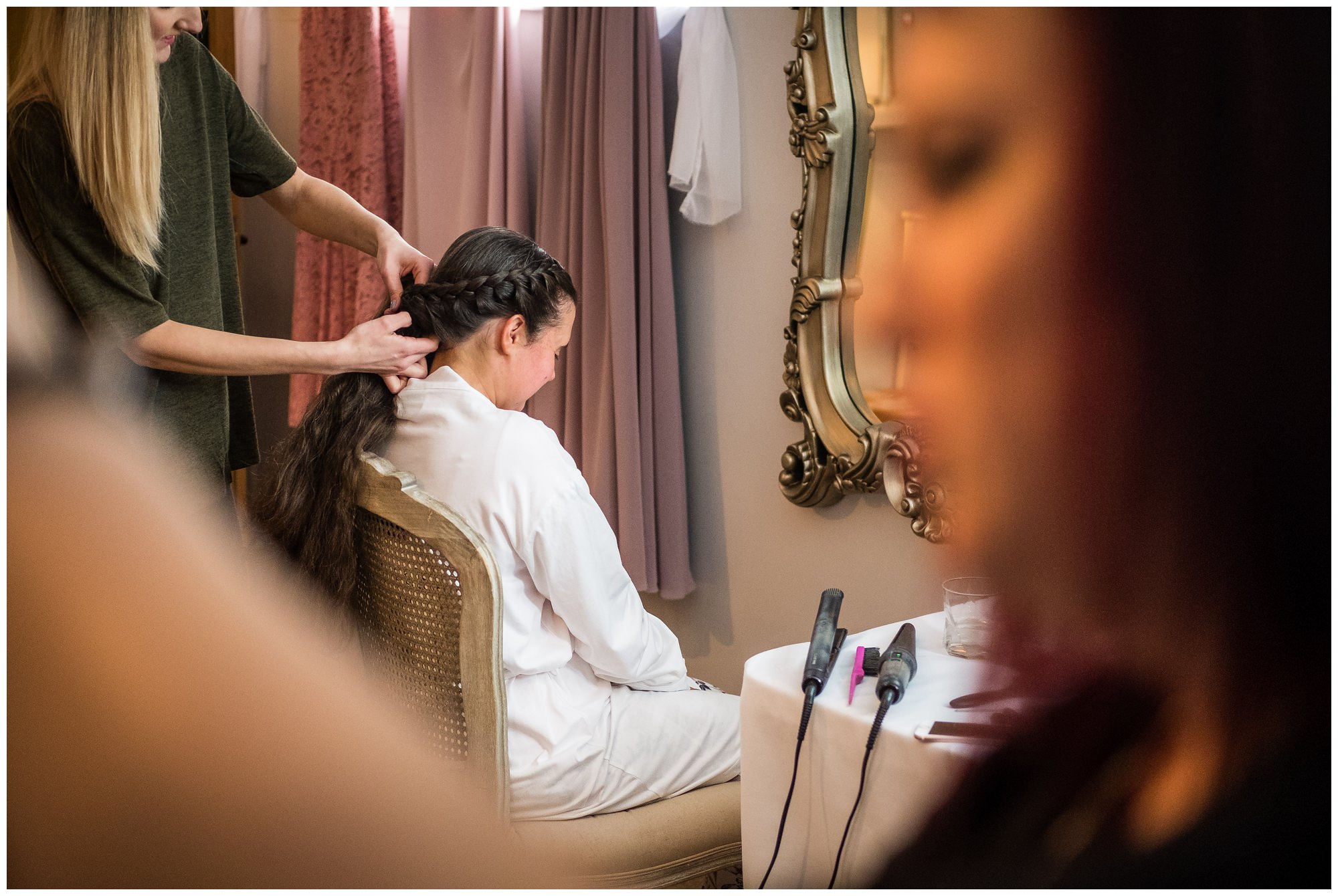 bridesmaid having her hair done