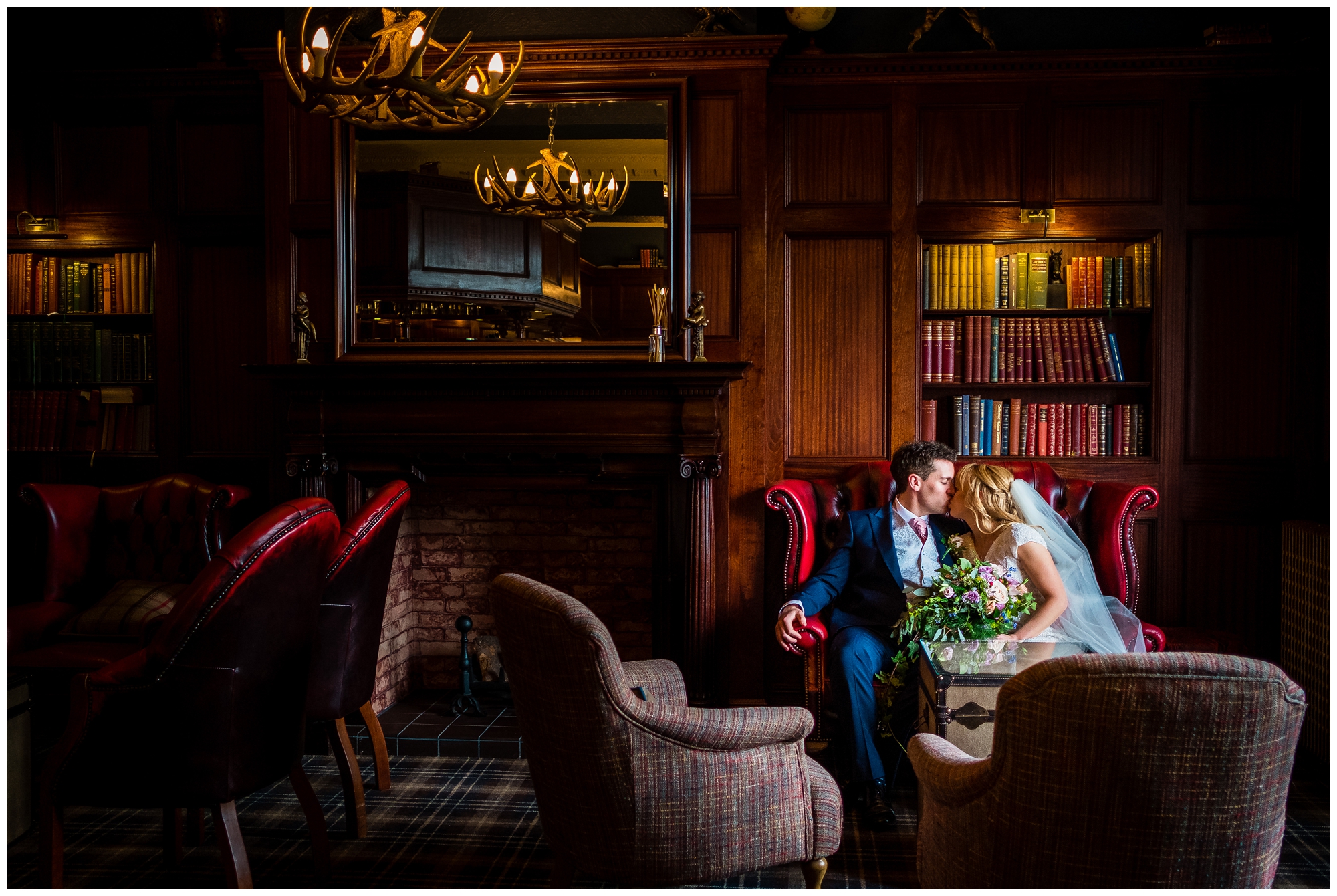 bride and groom in library room at ashfield house