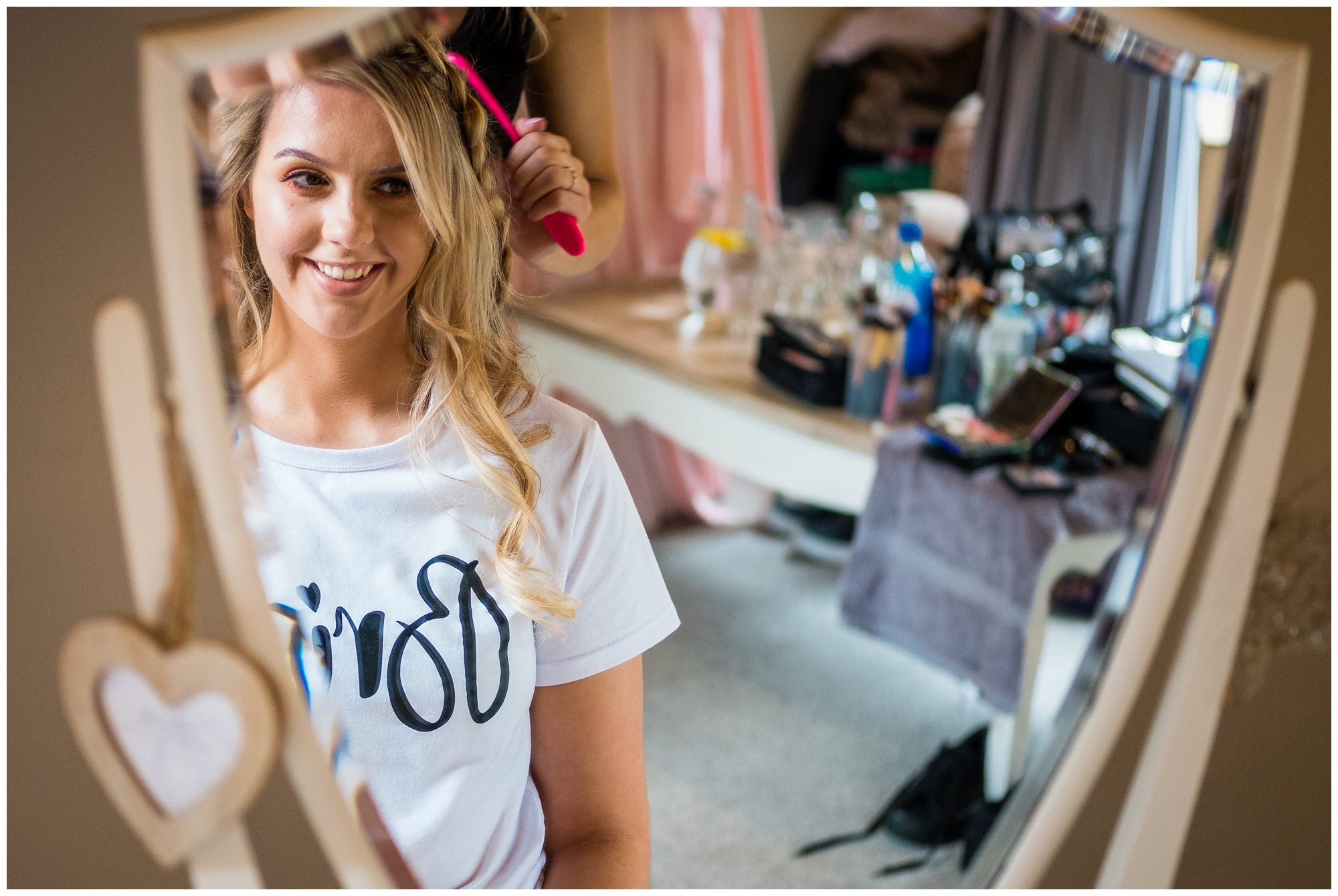 bride having her hair done