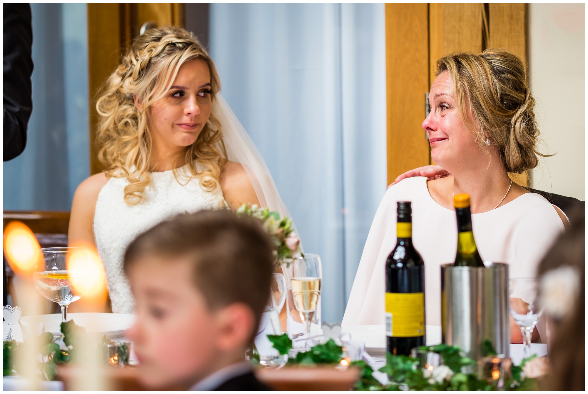 bride and mum exchanging glances