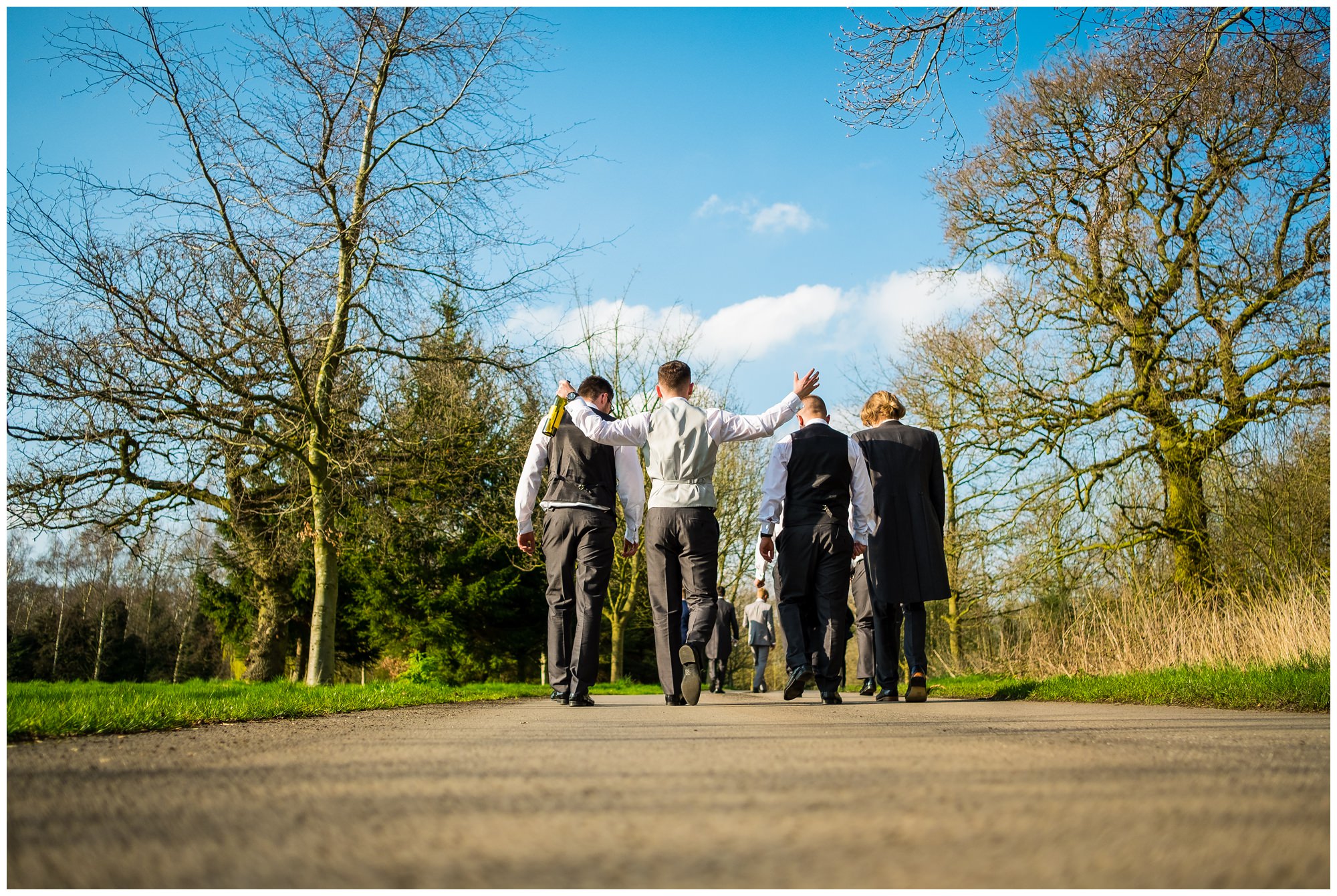 groom and friends going for a walk