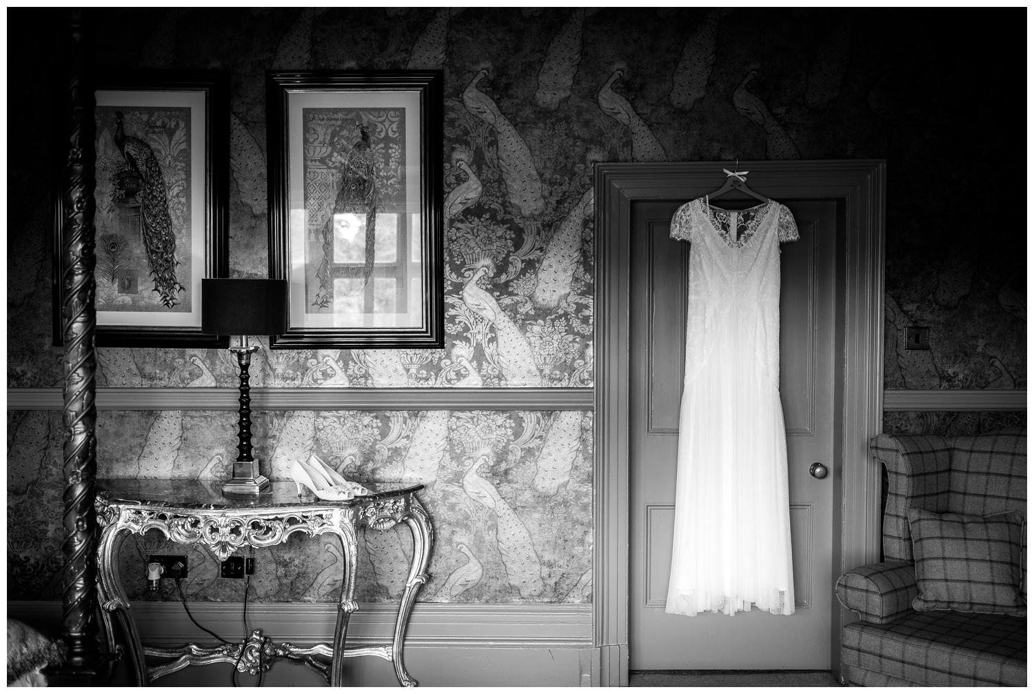 wedding dress hung at mitton hall