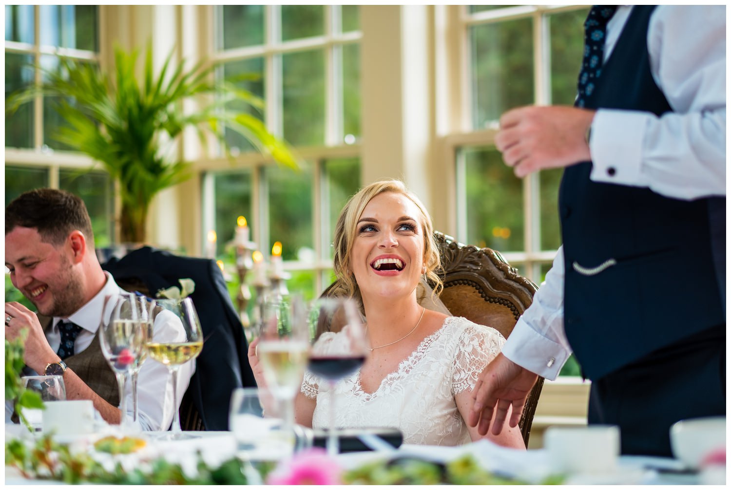 bride watching dad give his speech