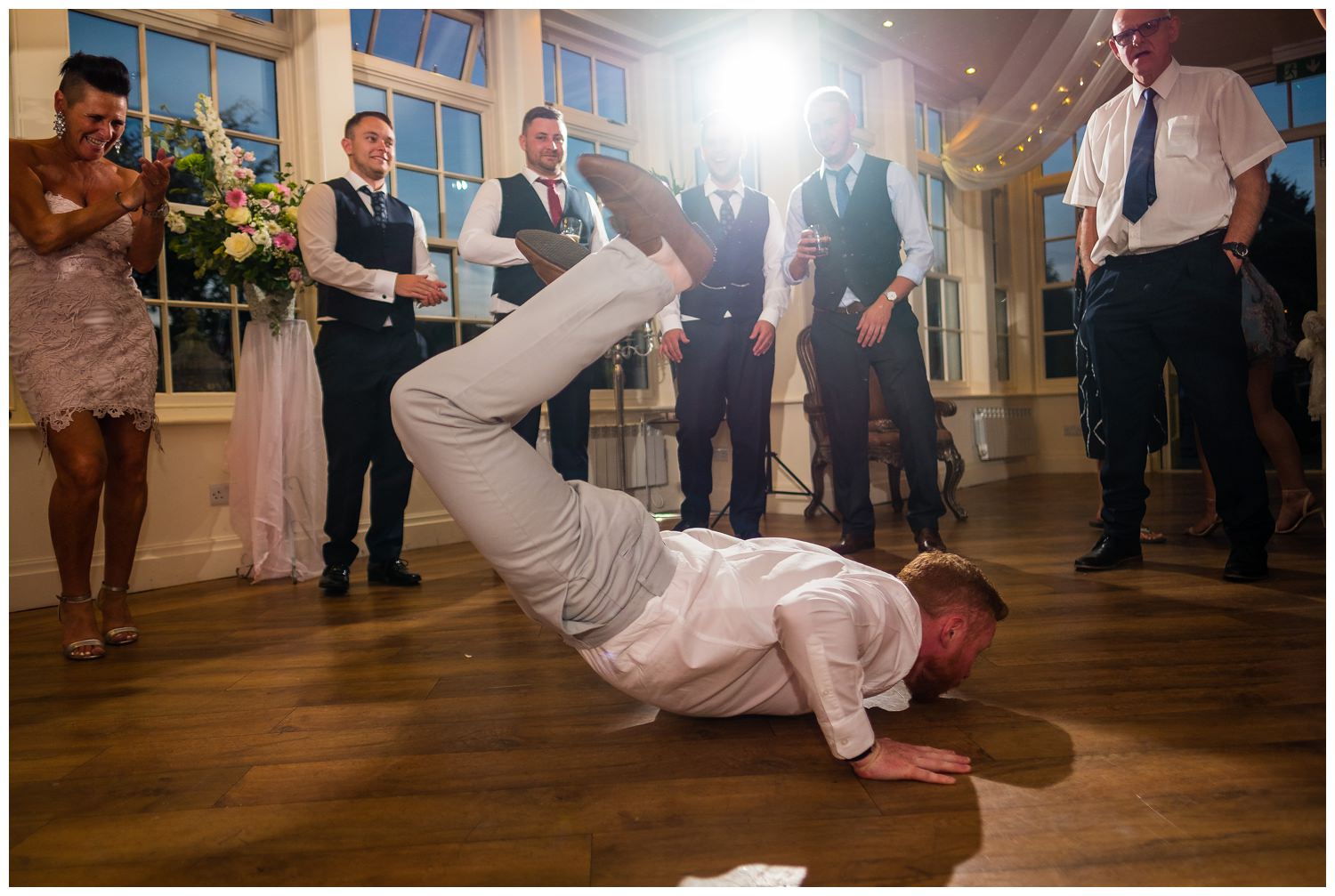 guest doing the worm at wedding