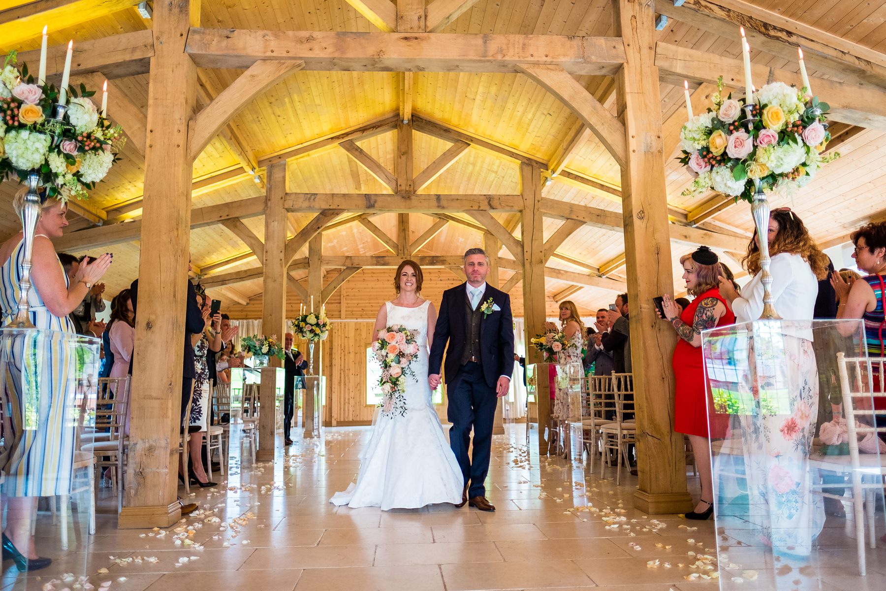 bride and groom walking down the aisle