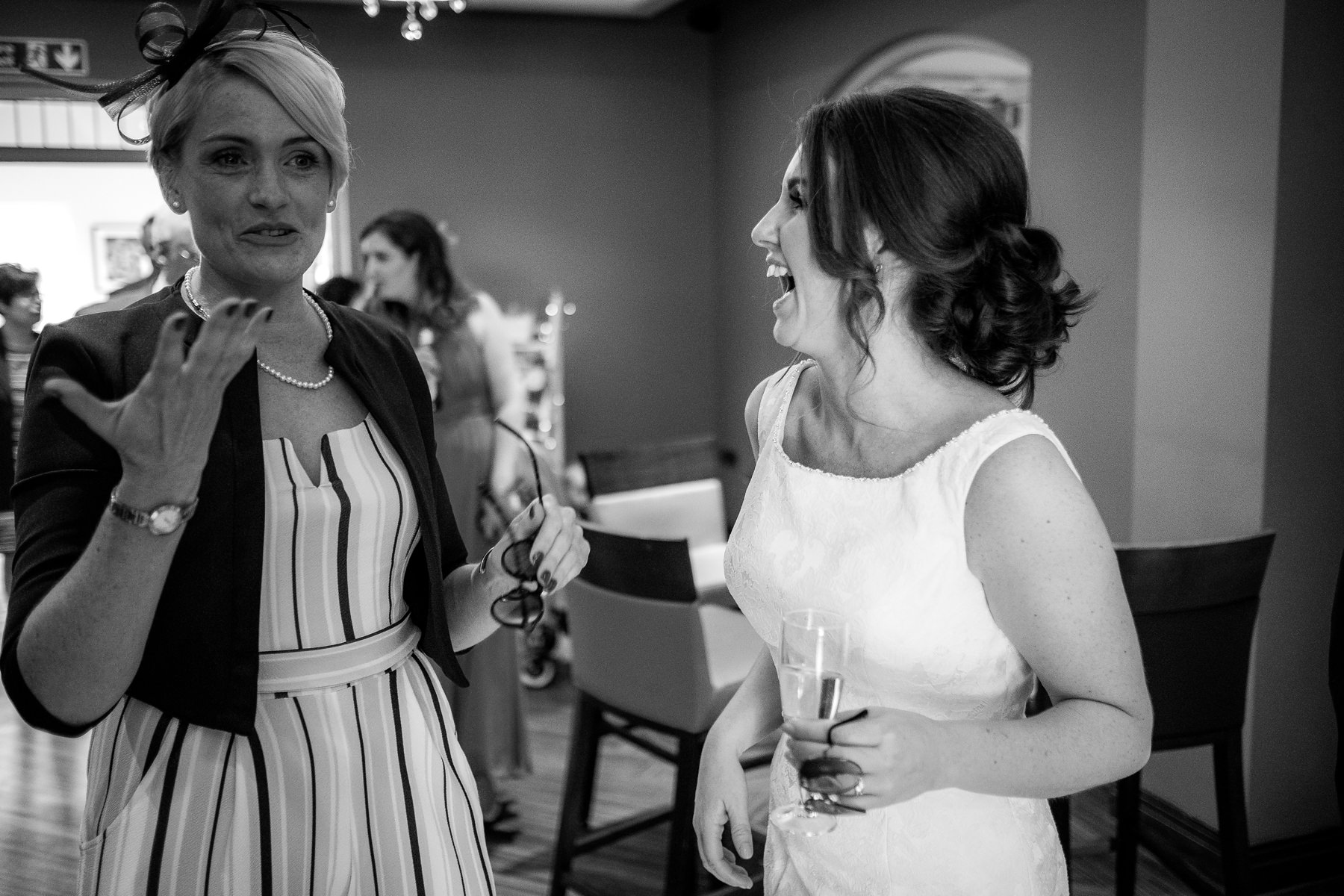 bride laughing with friends