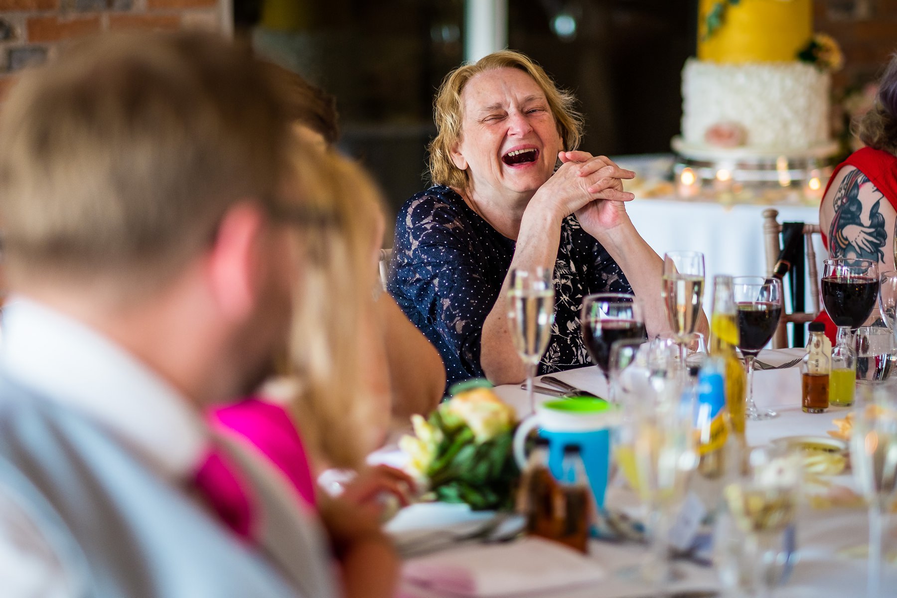 guest laughing during speeches