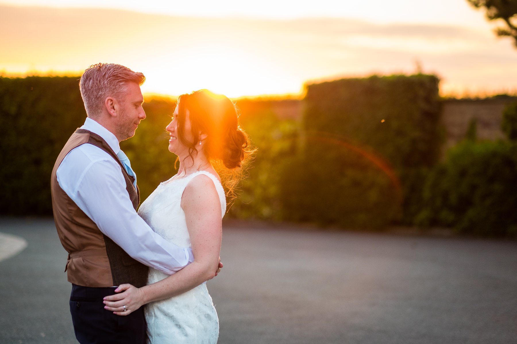 sunset portrait of bride and groom