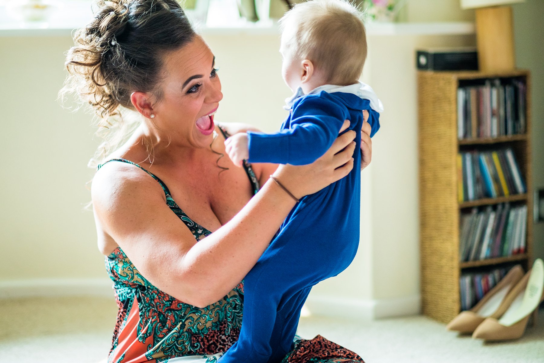 bridesmaid playing with baby