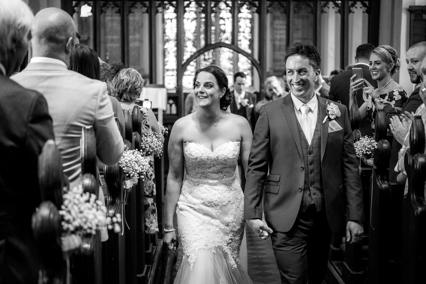 bride and groom leaving the church, lancashire