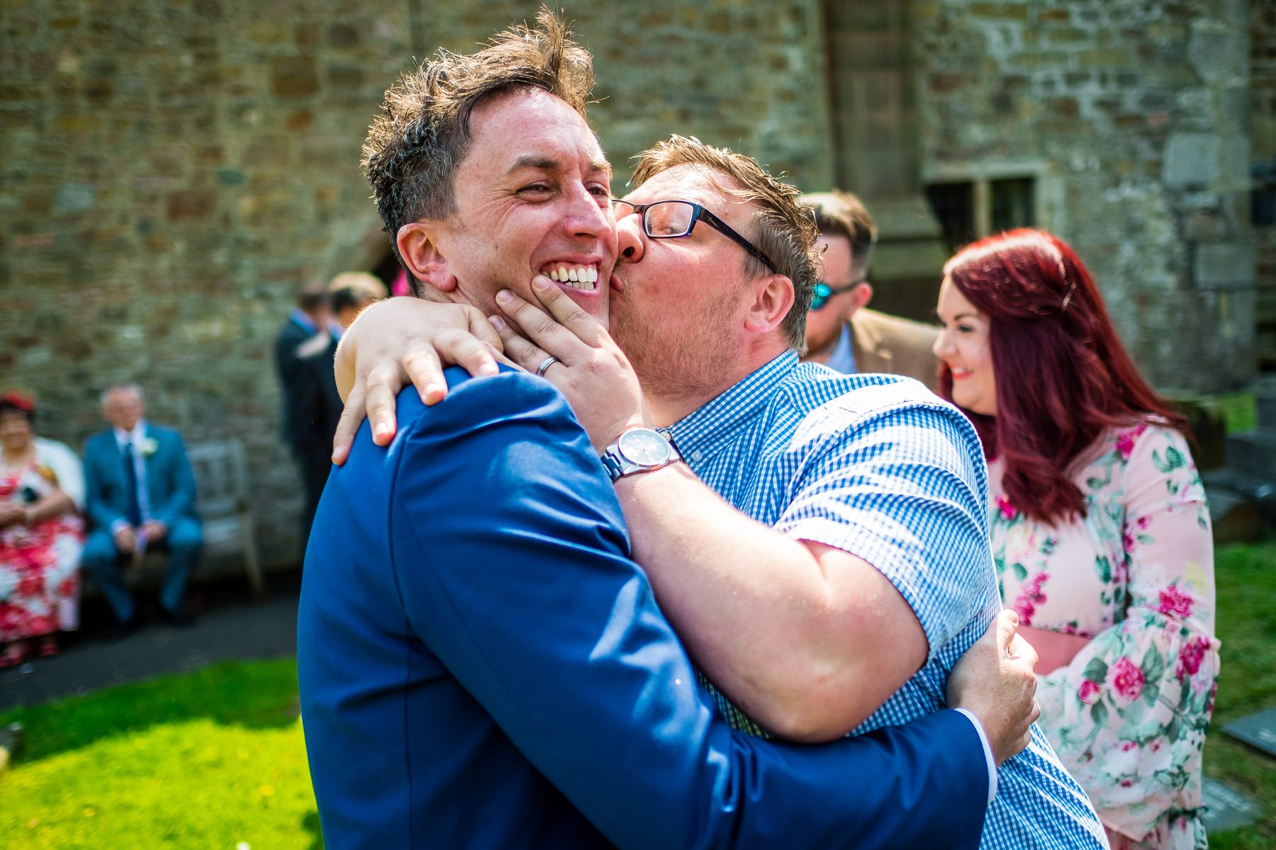 guest kissing groom