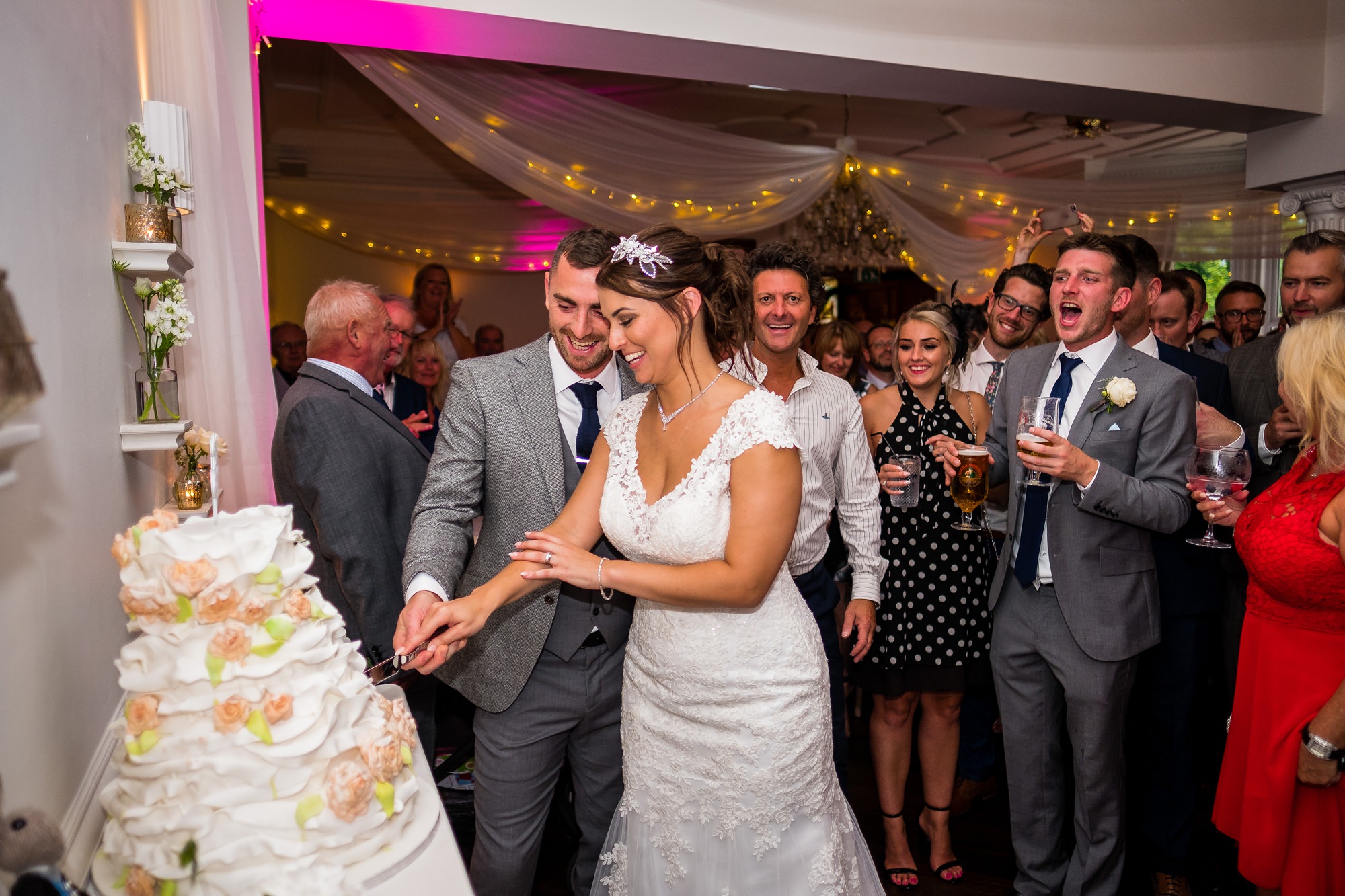 cutting the wedding cake