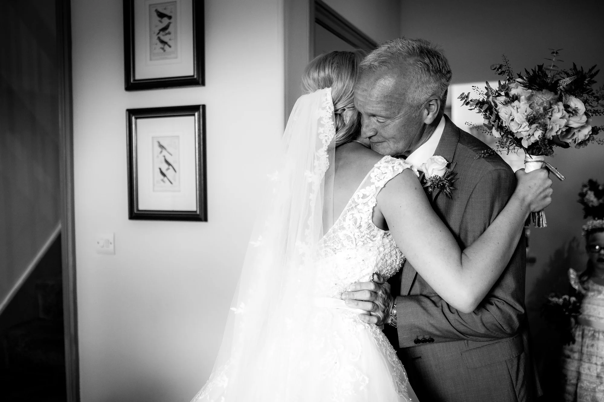 bride hugging dad