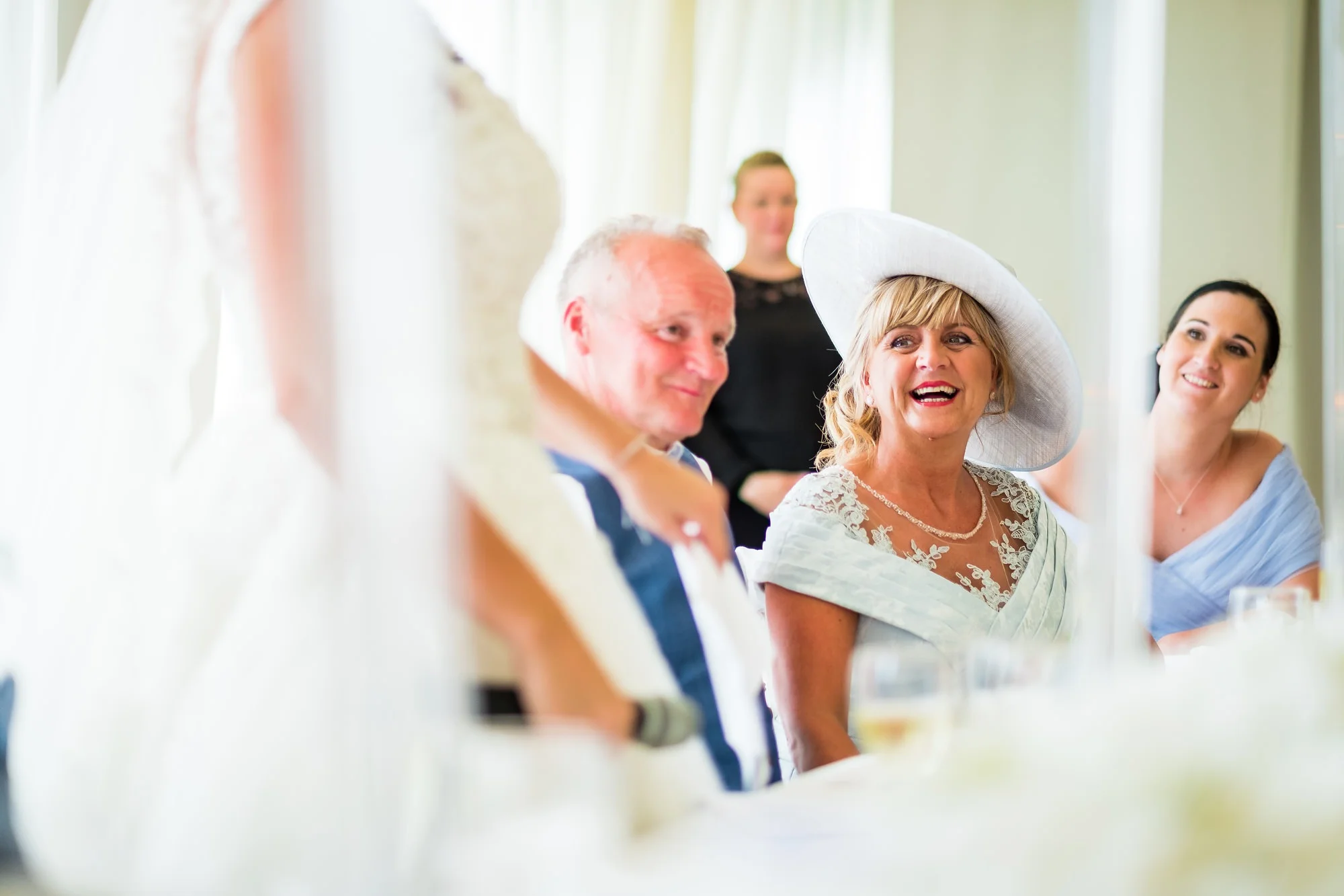 brides mum laughing during speeches