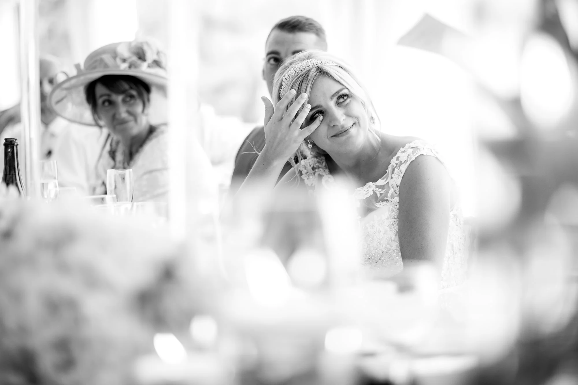 bride wiping a tear away