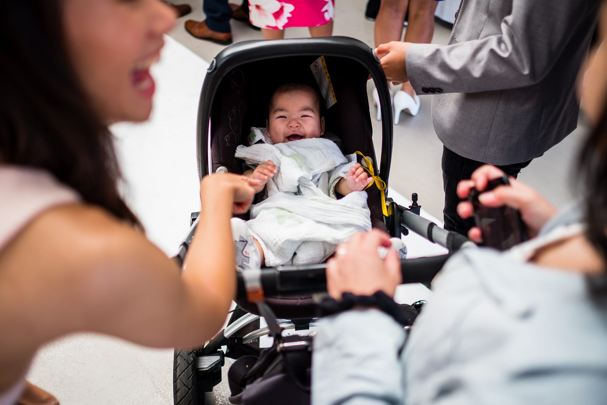 guests with baby in pram