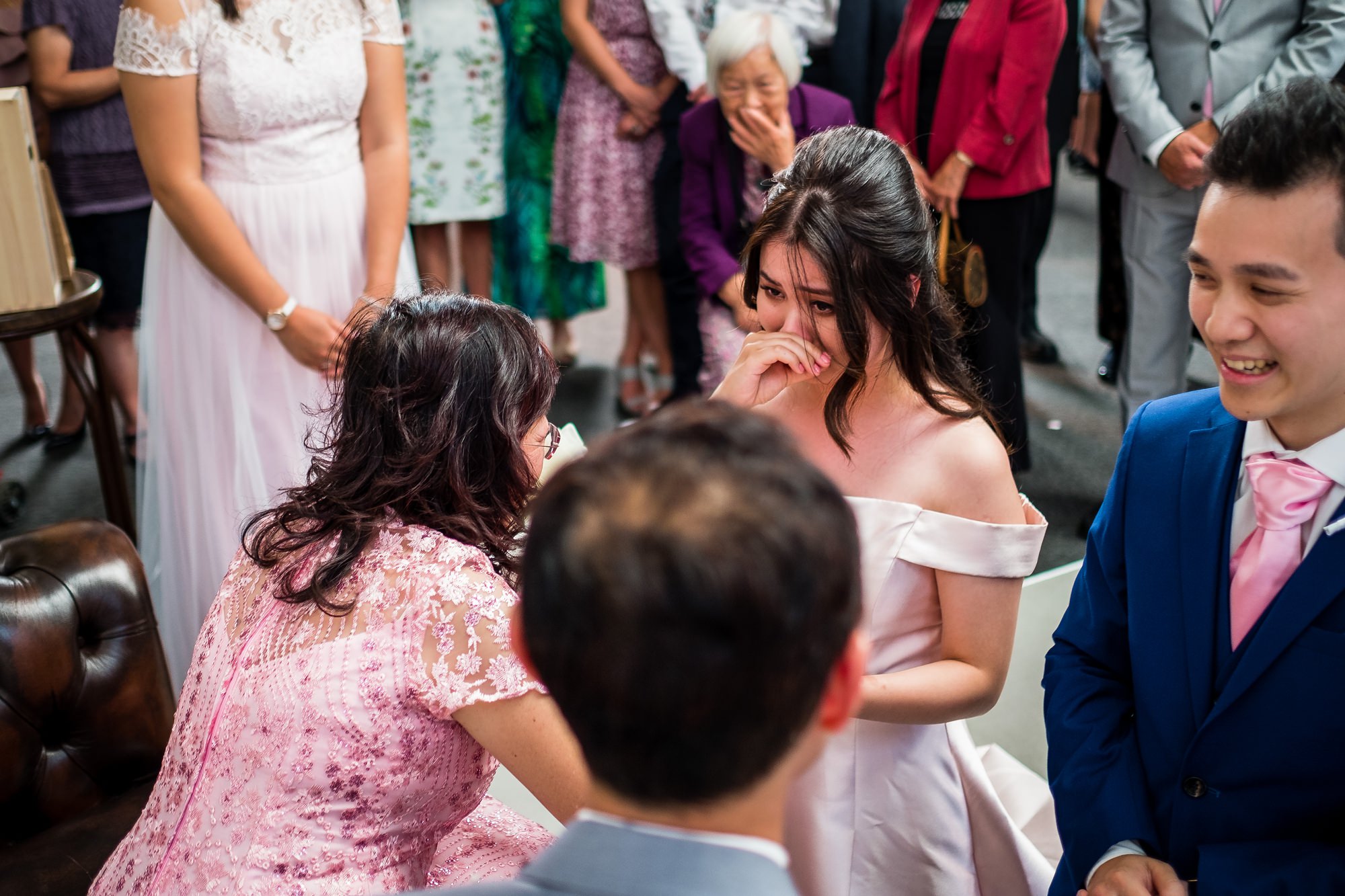 bride crying during tea serving ceremony