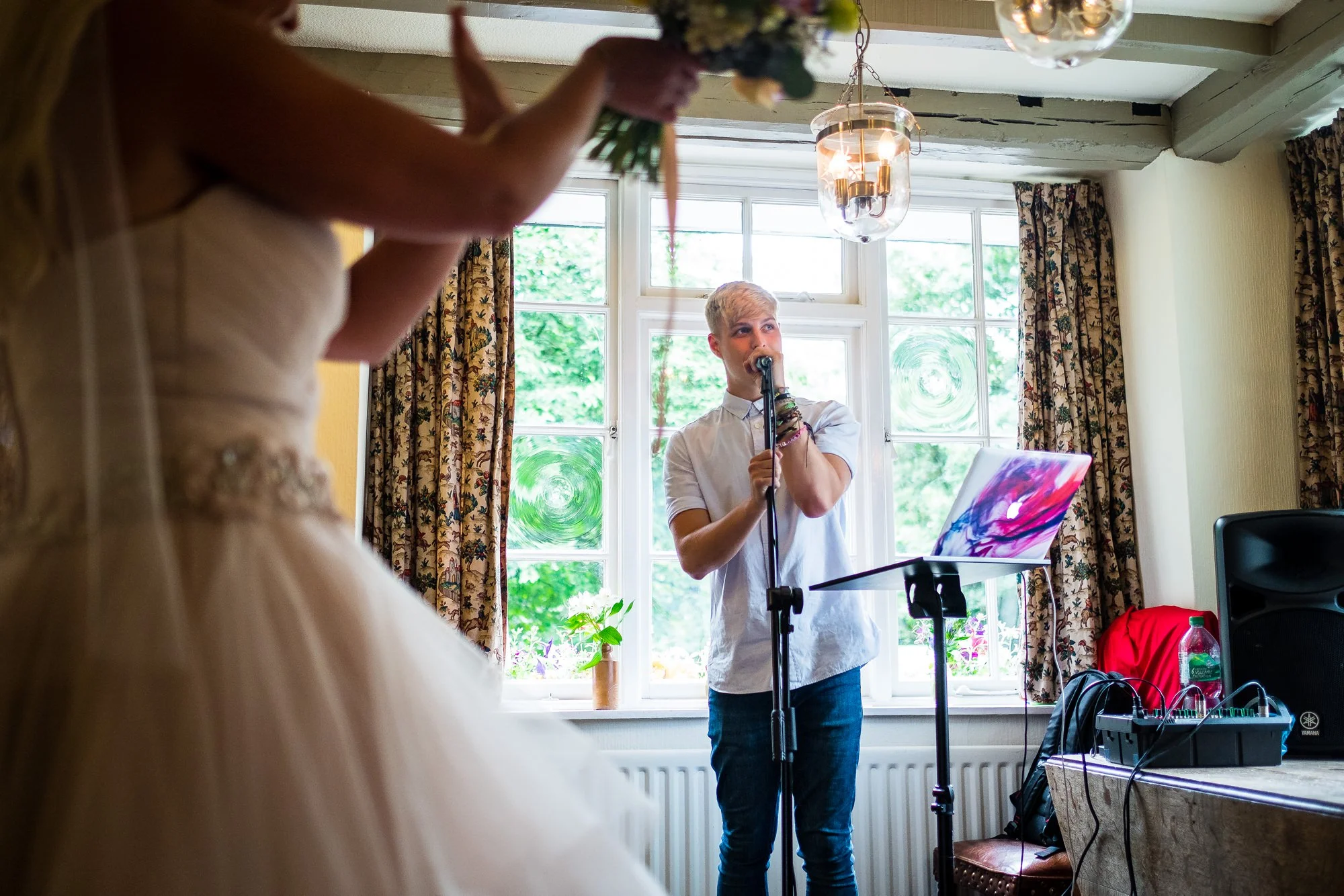 singer performing to bride