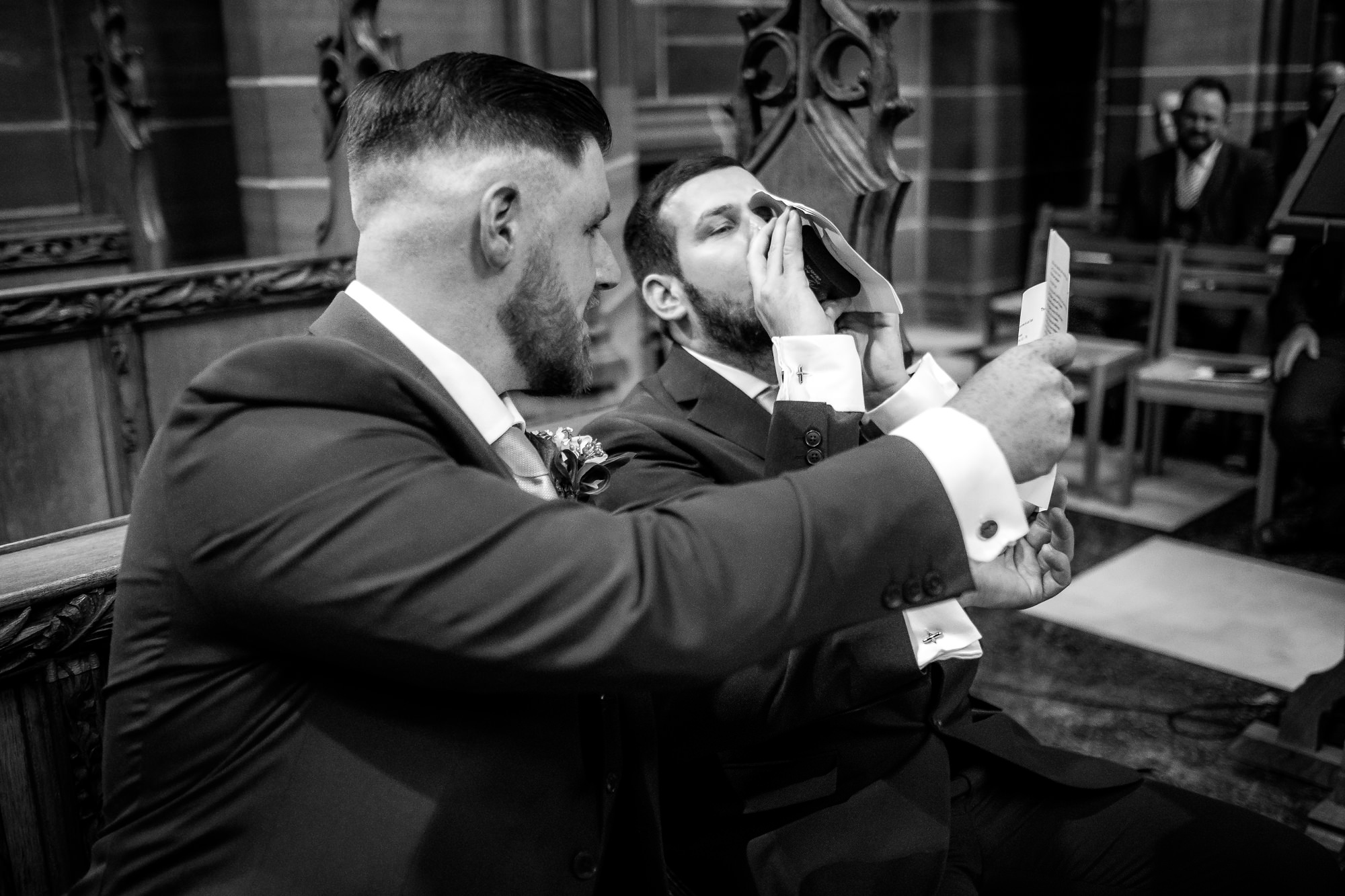groom having a quick drink before the wedding ceremony